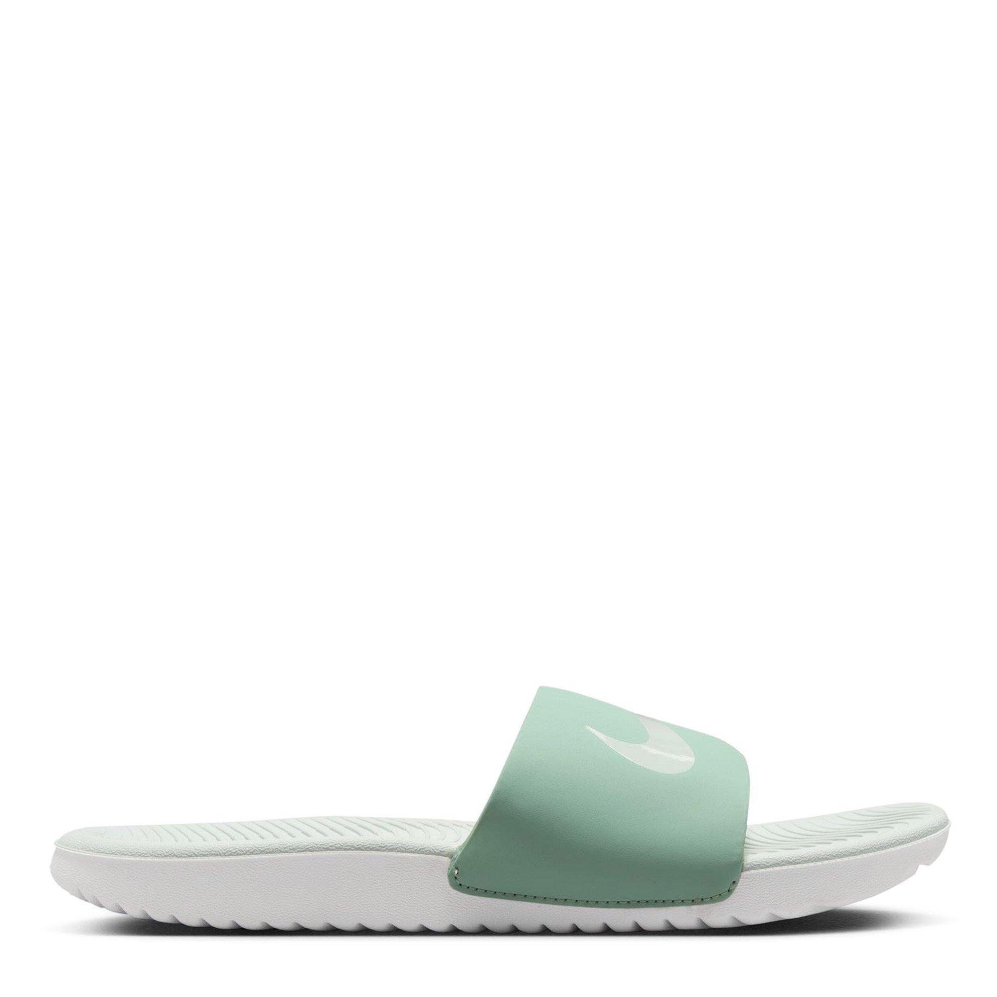 mint green nike sandals