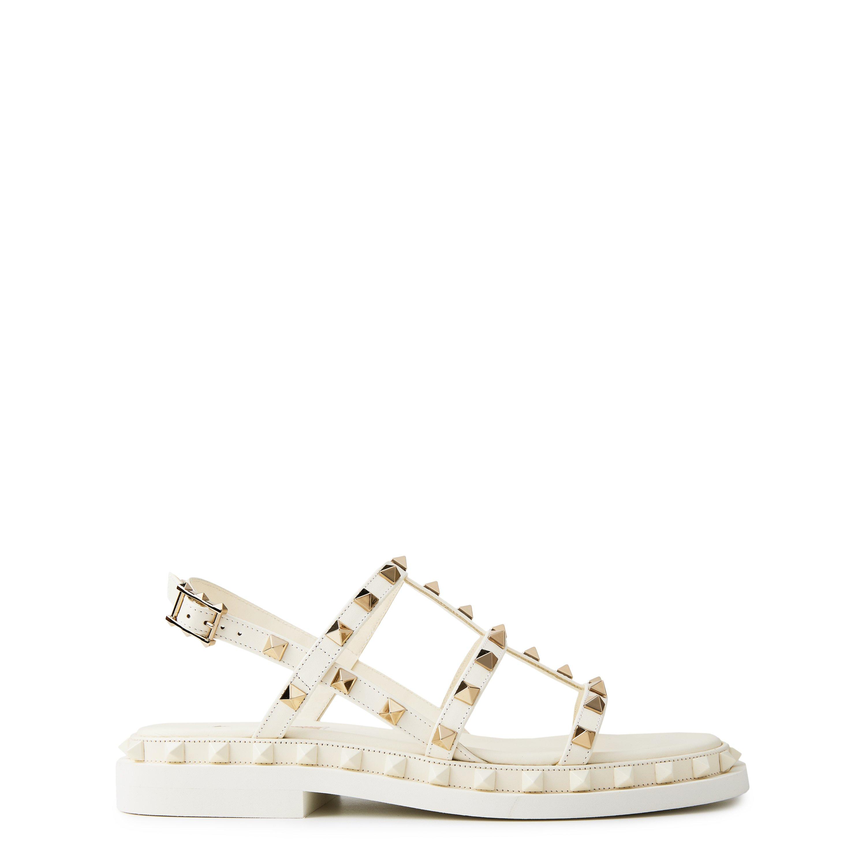 シューズ・サンダルその他 VALENTINO GARAVANI Woman Flat sandals White 4W0S0IZ5VRN YVR Valentino Garavani Rockstud PVC sandals in white - Valentino