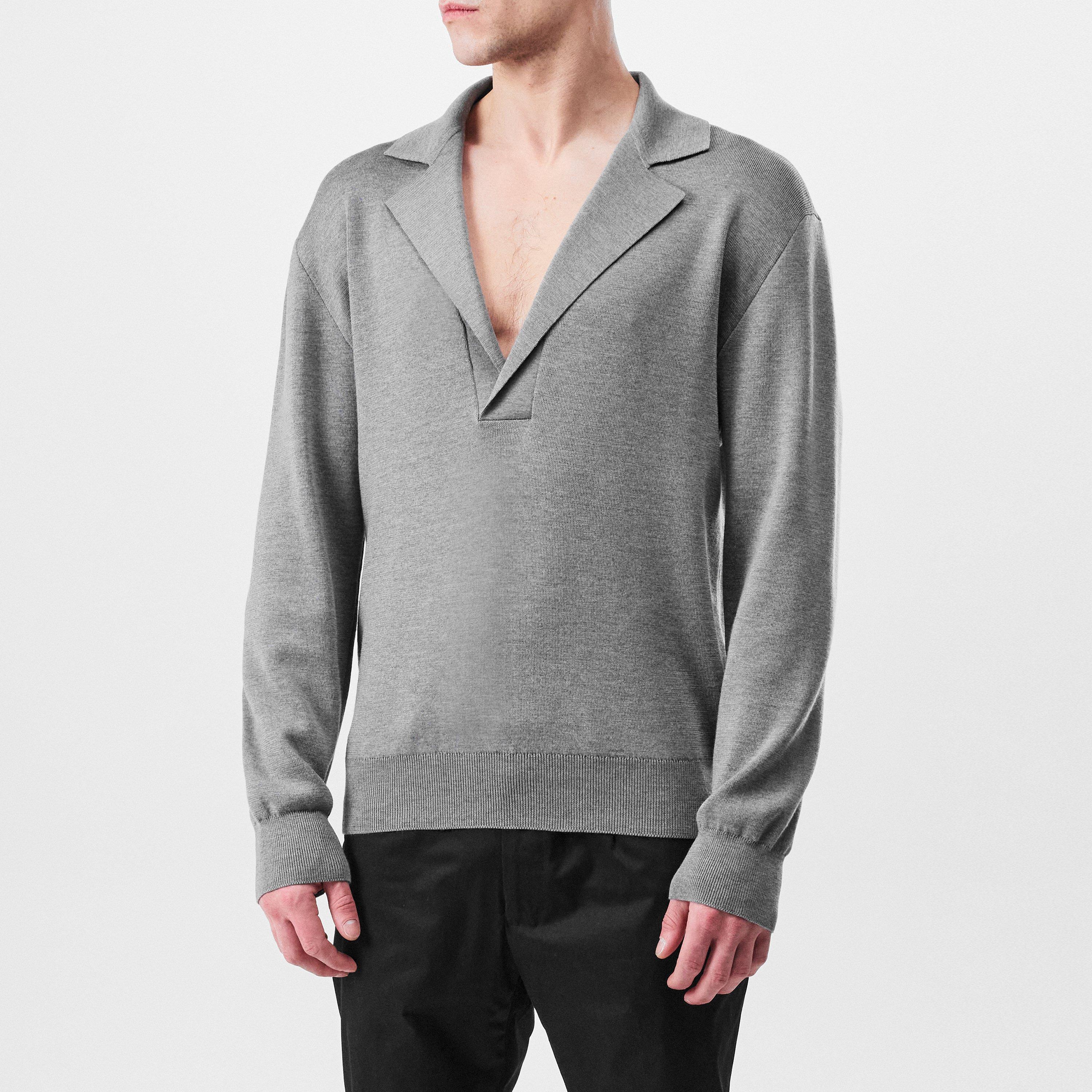 Dolce and Gabbana Wool V-Neck Sweater With Dg Embroidery | Cruise