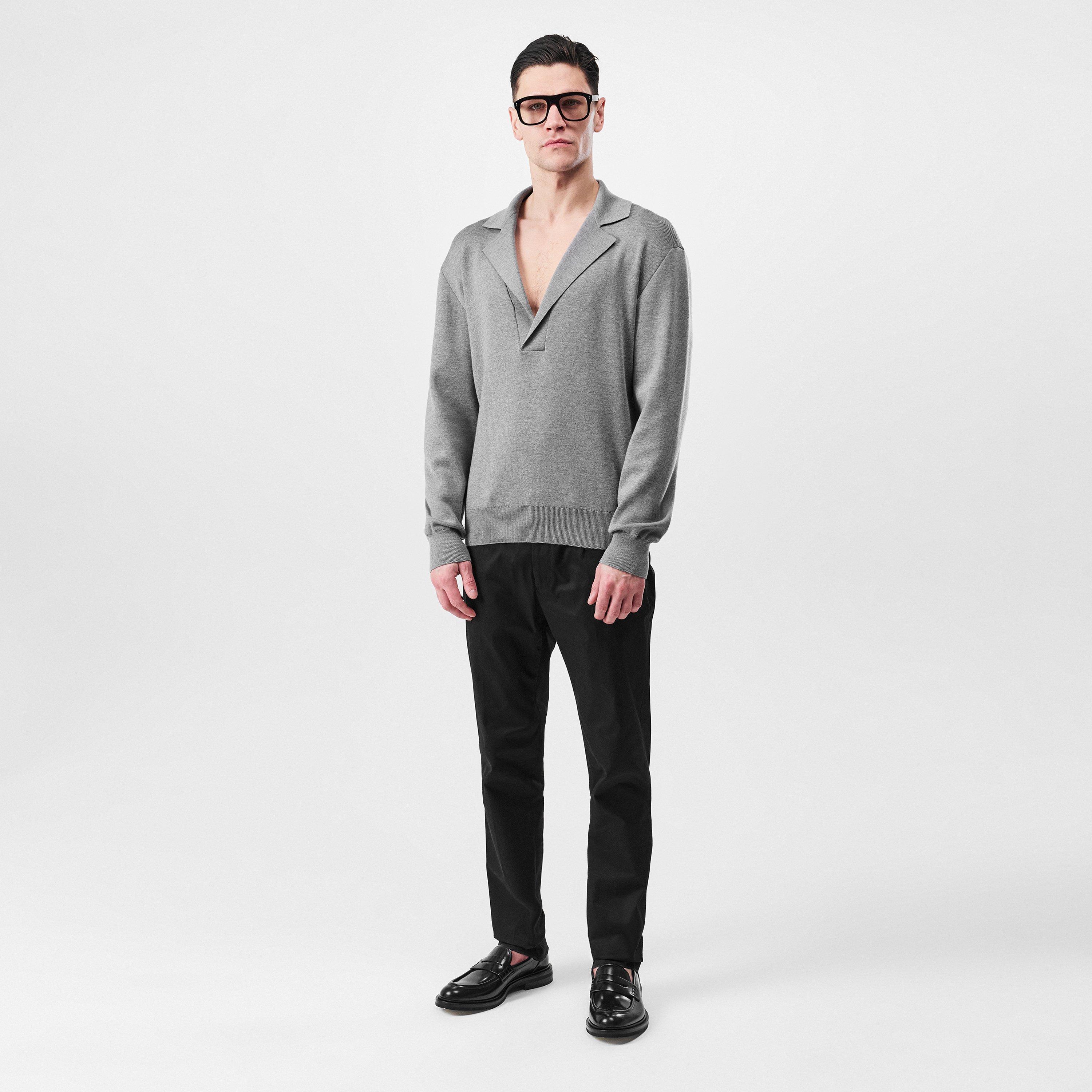 Dolce and Gabbana Wool V-Neck Sweater With Dg Embroidery | Cruise