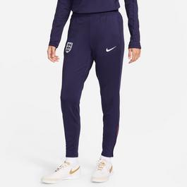 Nike navy blazer with brown pants