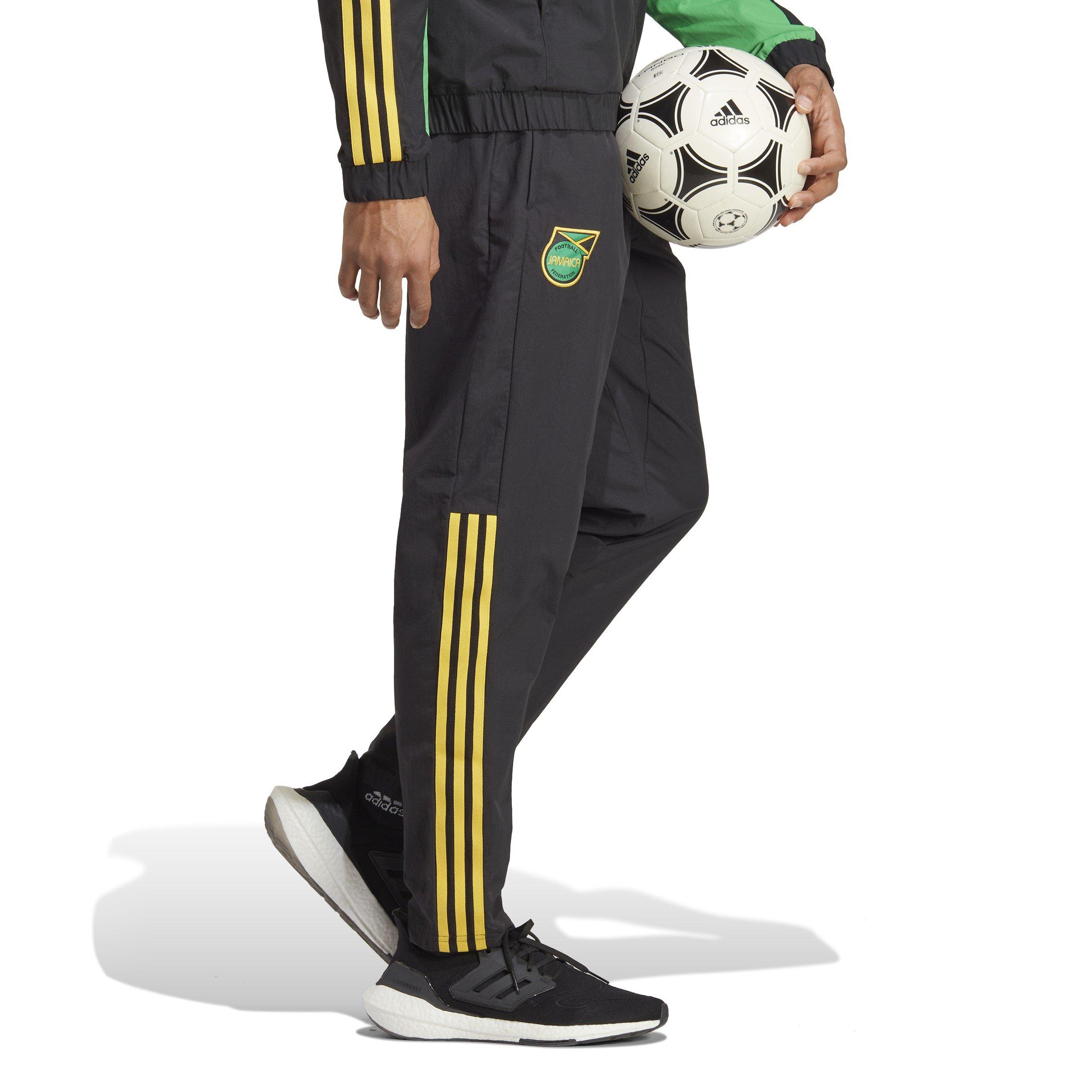 adidas Jamaica Pre Match Tracksuit Bottoms 2023 Adults Pantalones de chandal con licencia internacional. Sports Direct