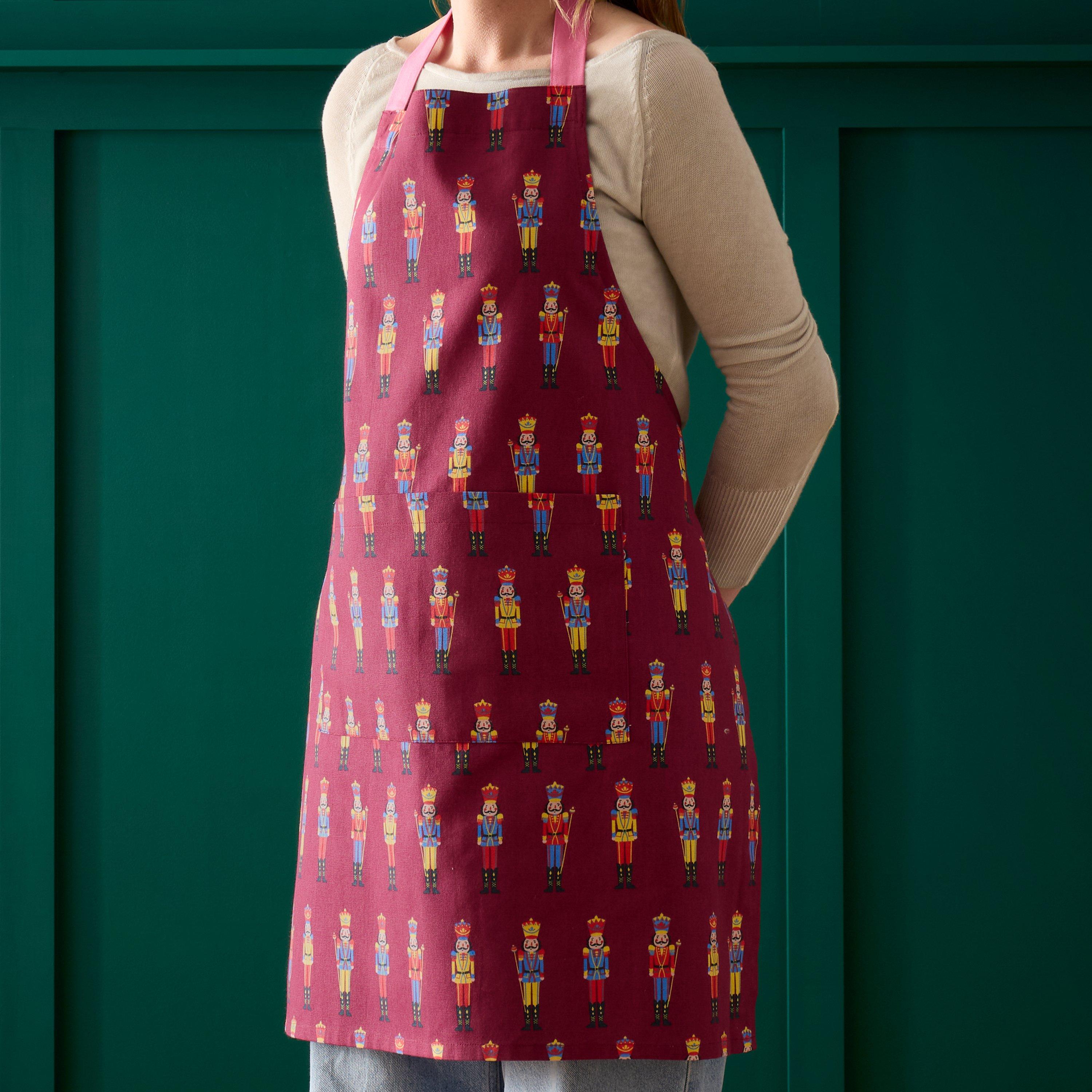 Catherine Lansfield  Christmas Nutcracker Cotton Kitchen Adult Apron - Plum - 70x80cm
