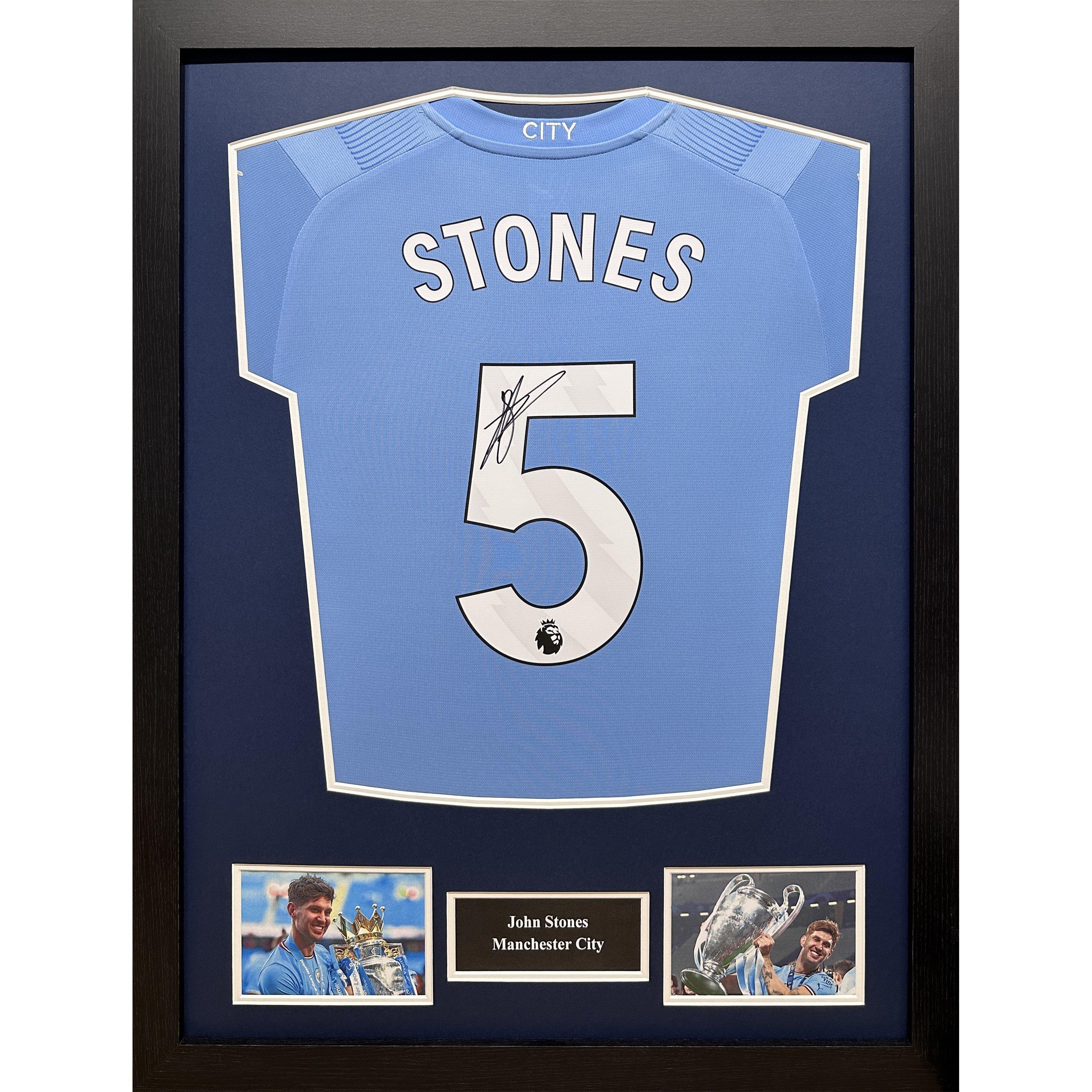 Allstarsignings Ltd  John Stones Signed & Framed Manchester City Shirt - Blue