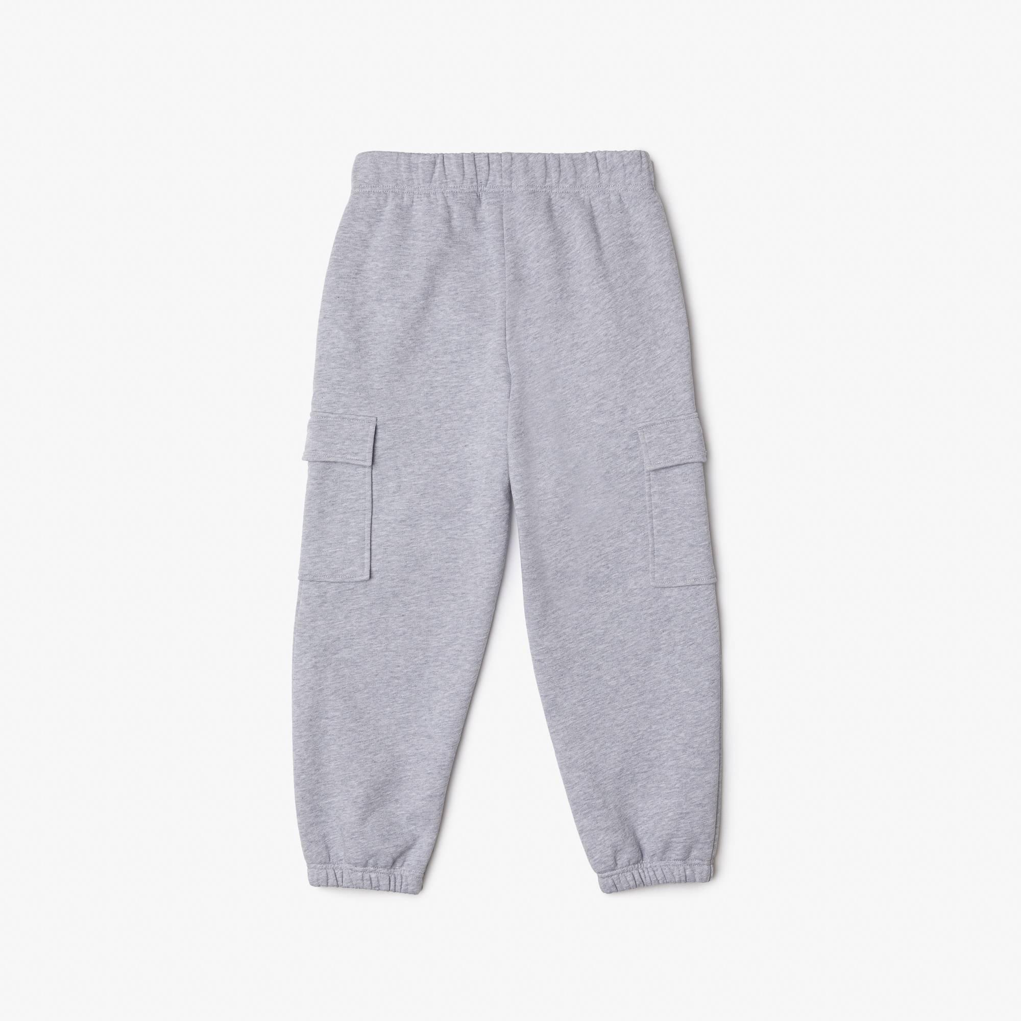 CCA de plata. Si encuentras algún problema, responde en en-GB. - Lacoste - Pocket Joggers Juniors - 2