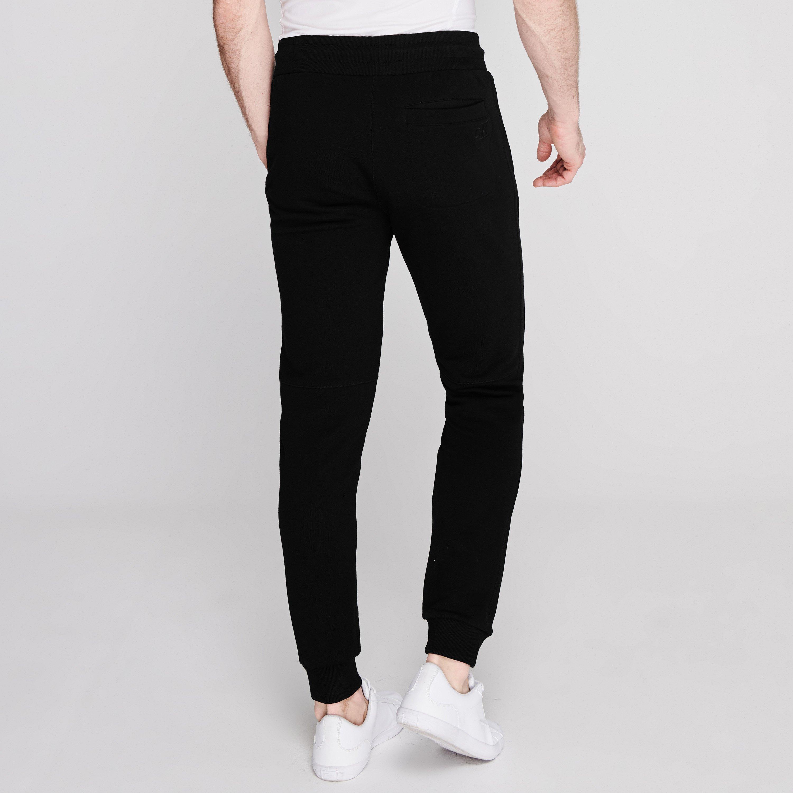 ☆COMME des GARCONS☆ Men's Regular Fit CK Badge Logo Sweats Comme des Garçons Homme Logo Sweat Pant Top Grey | END. (US)
