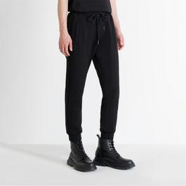Antony Morato FLEECE TROUSERS REGULAR FIT IN LIGTH SCUBA STRETCH VISCOSE BLEND FABRIC WITH LOGOED METAL BADGE