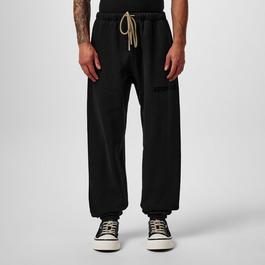 Fear Of God Essentials Tapered Logo Appliquéd Cotton Blend Jersey Sweatpants