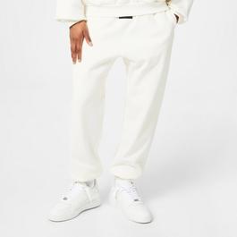 Fear Of God Essentials Tapered Logo Appliquéd Cotton Blend Jersey Sweatpants