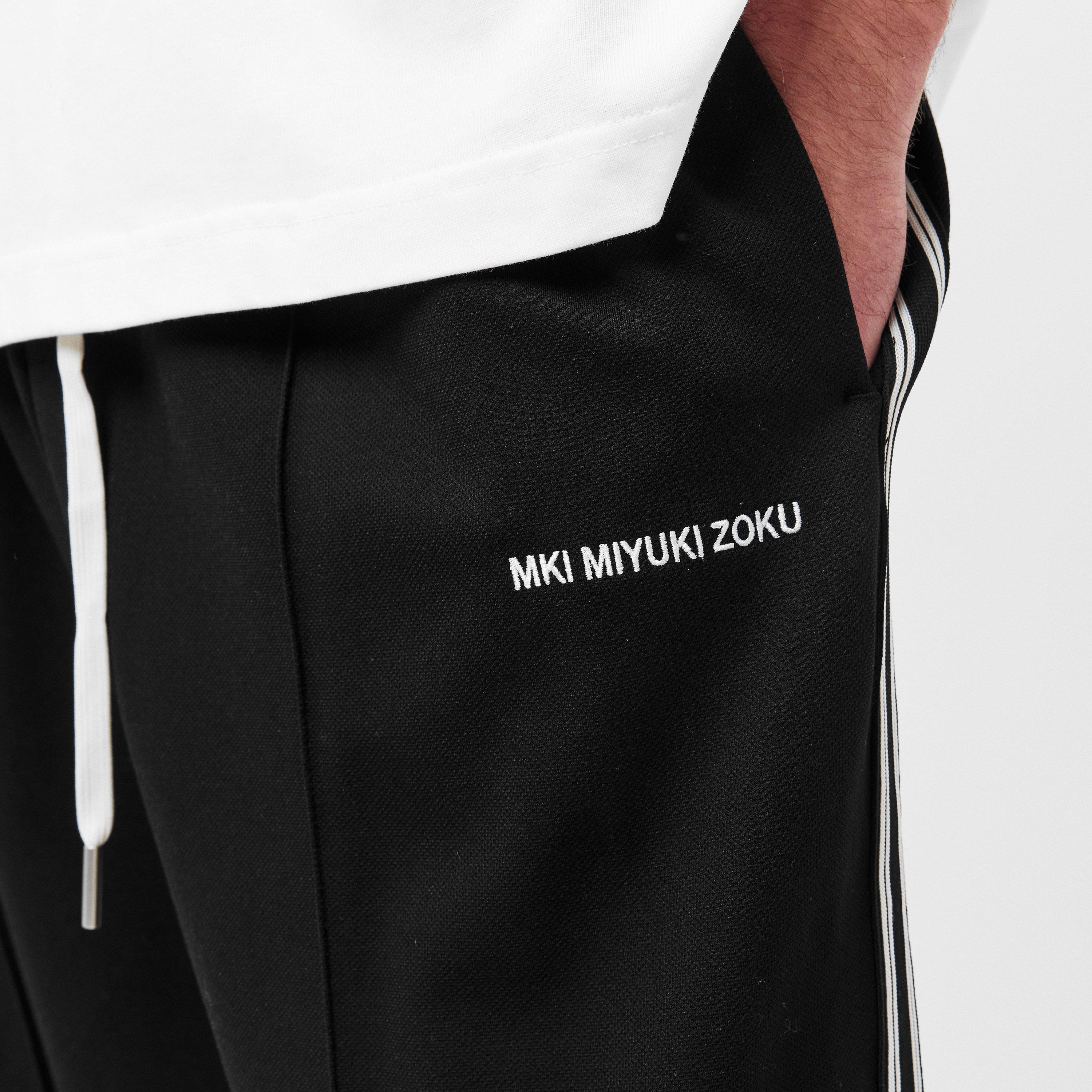 MKI Men's Wide Fit Open Hem Woven Tracksuit Joggers | Flannels