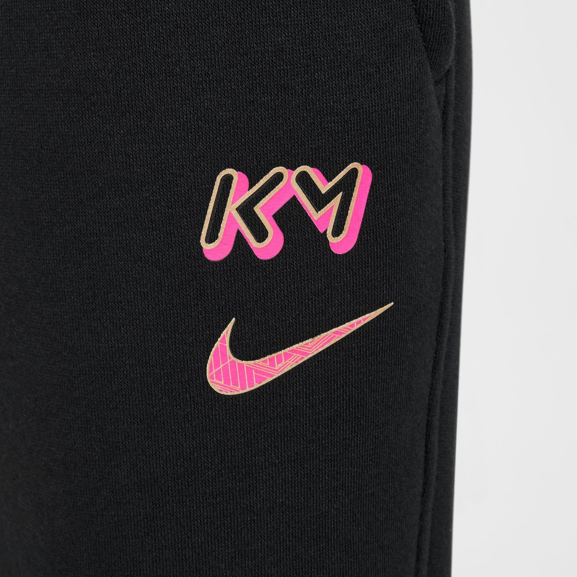 black and pink nike pants