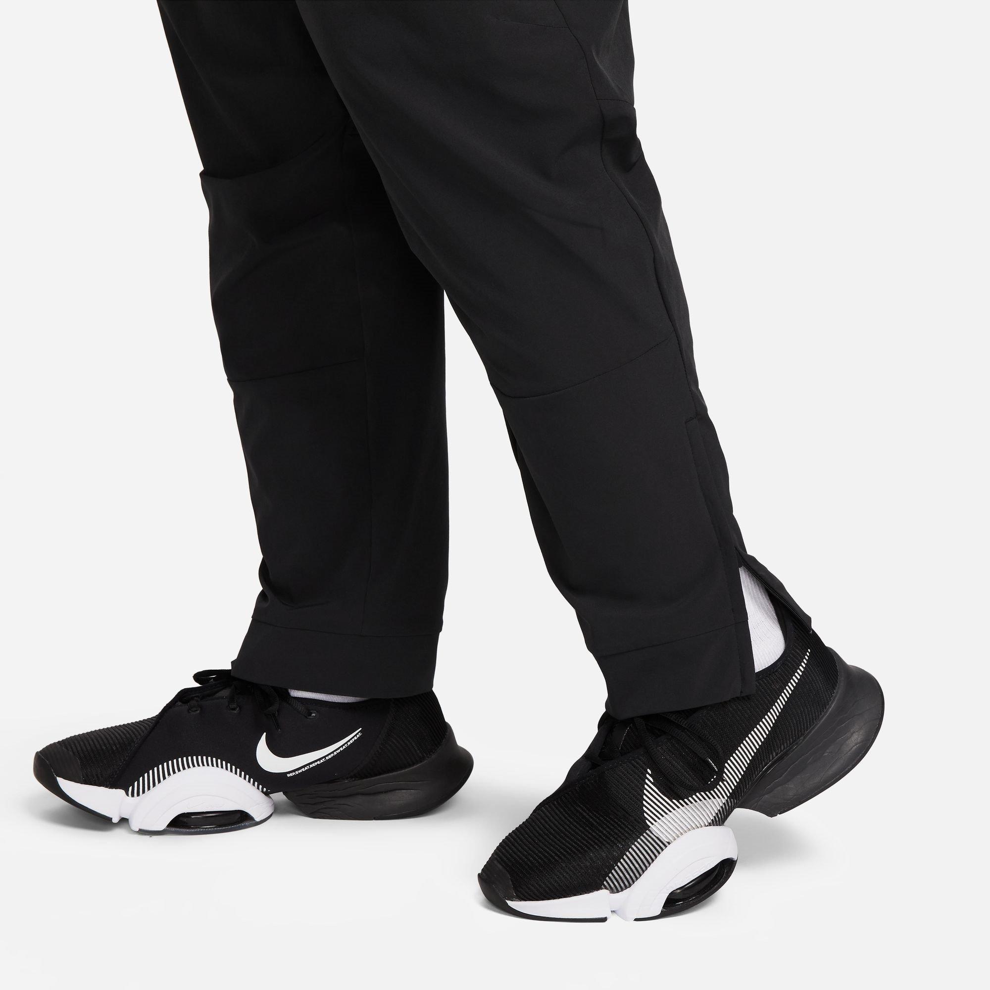 Triple Black - Nike - Unlimited Men's Dri-FIT Zippered Cuff Versatile Pants - 12