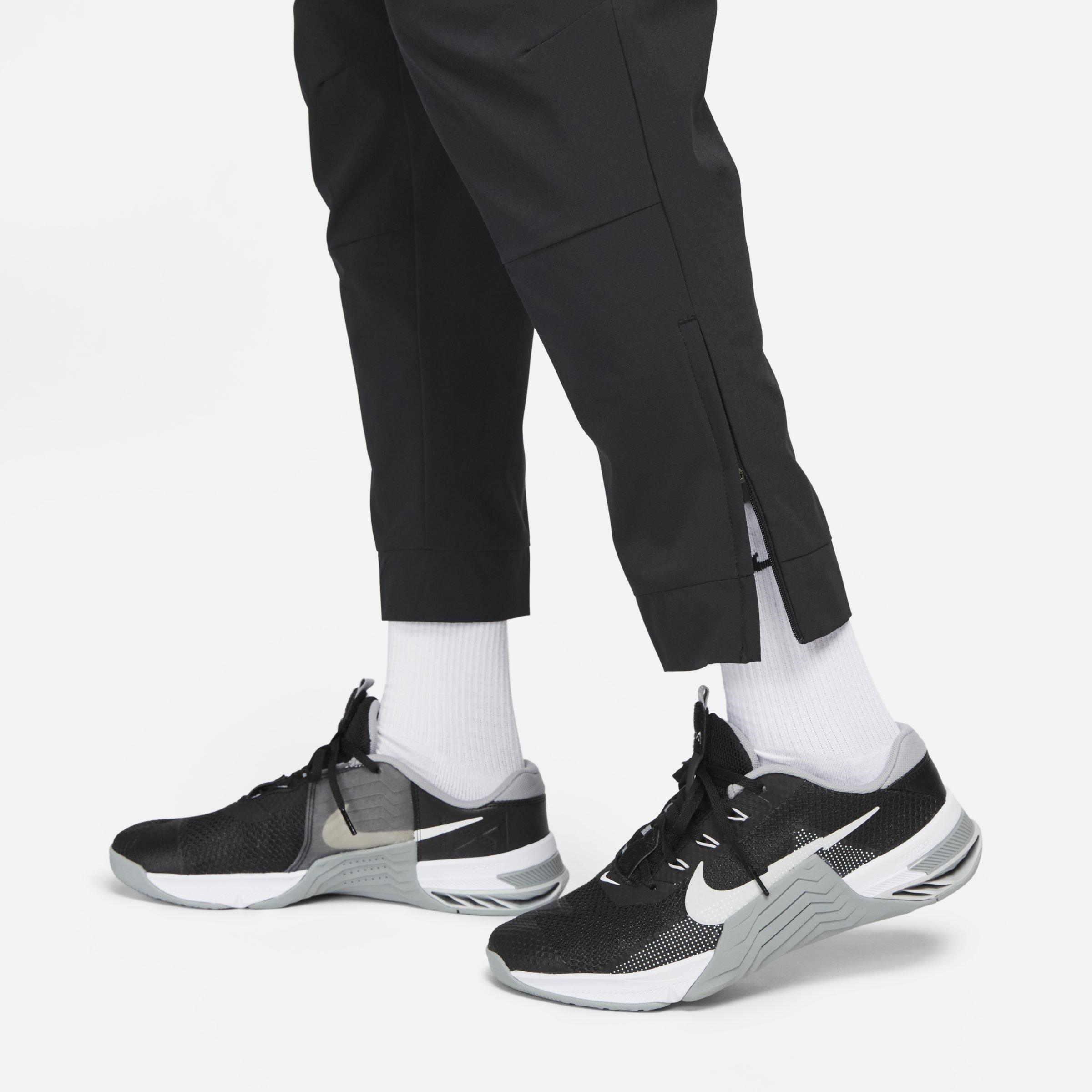 Triple Black - Nike - Unlimited Men's Dri-FIT Zippered Cuff Versatile Pants - 5