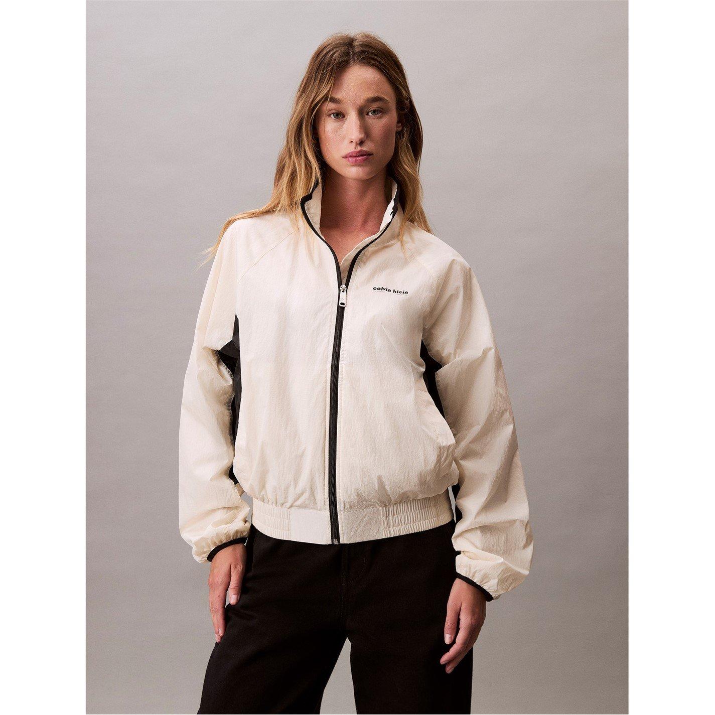Tofu - Calvin Klein Jeans - Women's Retro Track Funnel Neck Long Sleeve Windbreaker - 1