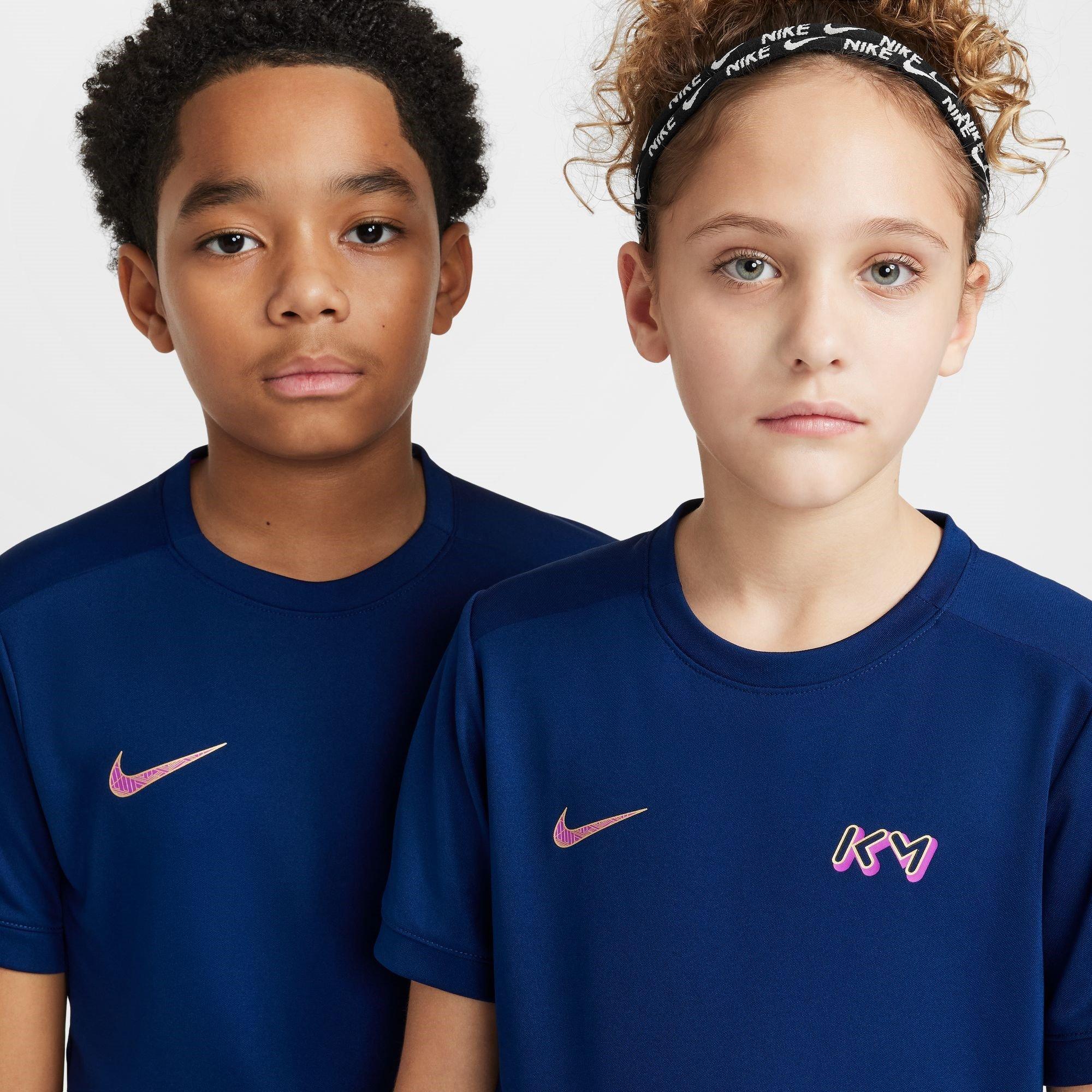 Blue/Met.Gold - Nike - Kylian Mbappe Academy Juniors  Dri-FIT Football Shirt - 6
