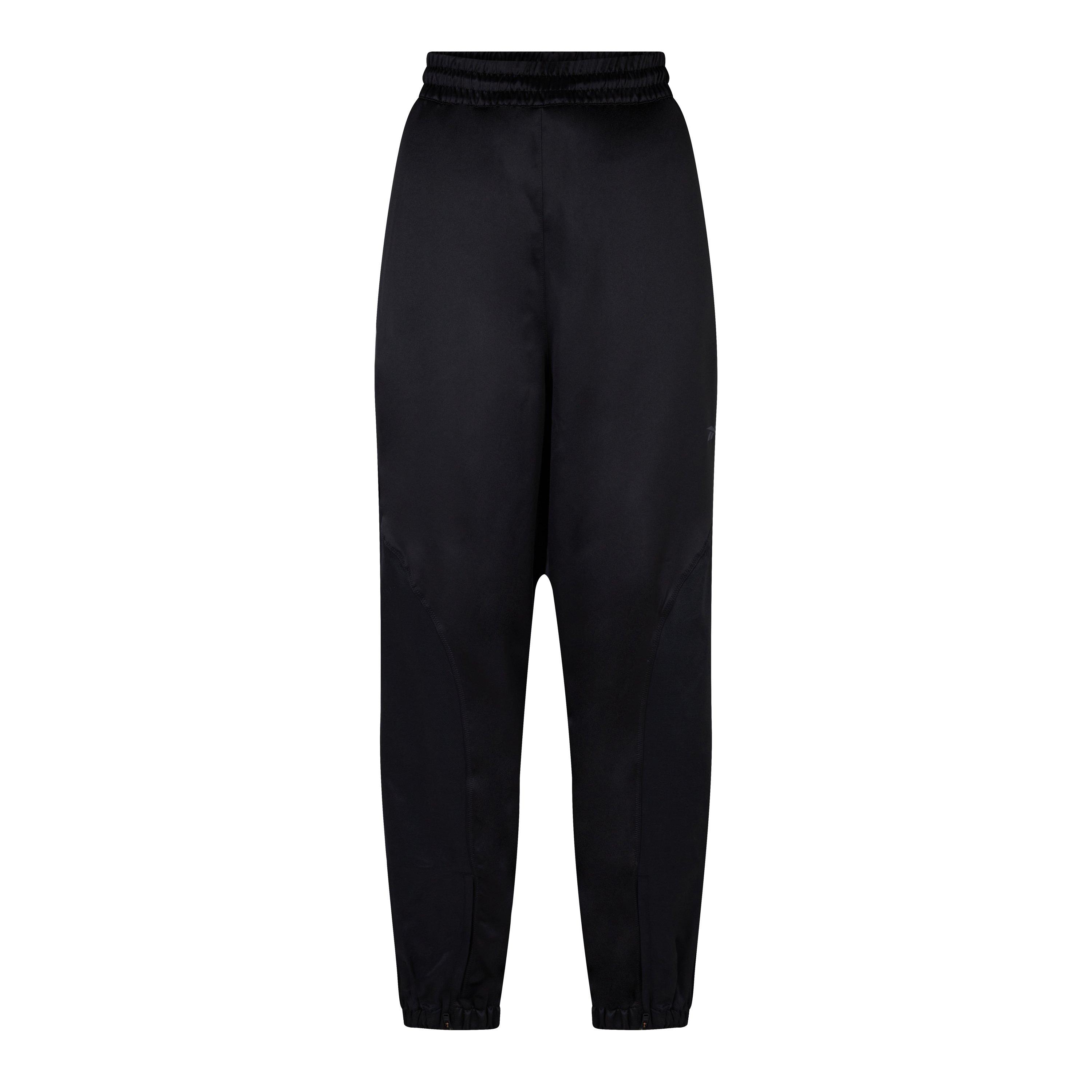 Crna - Reebok - Women's Tech Style Closed Hem Woven Joggers - 1