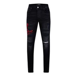 Amiri Snake Skinny Jeans