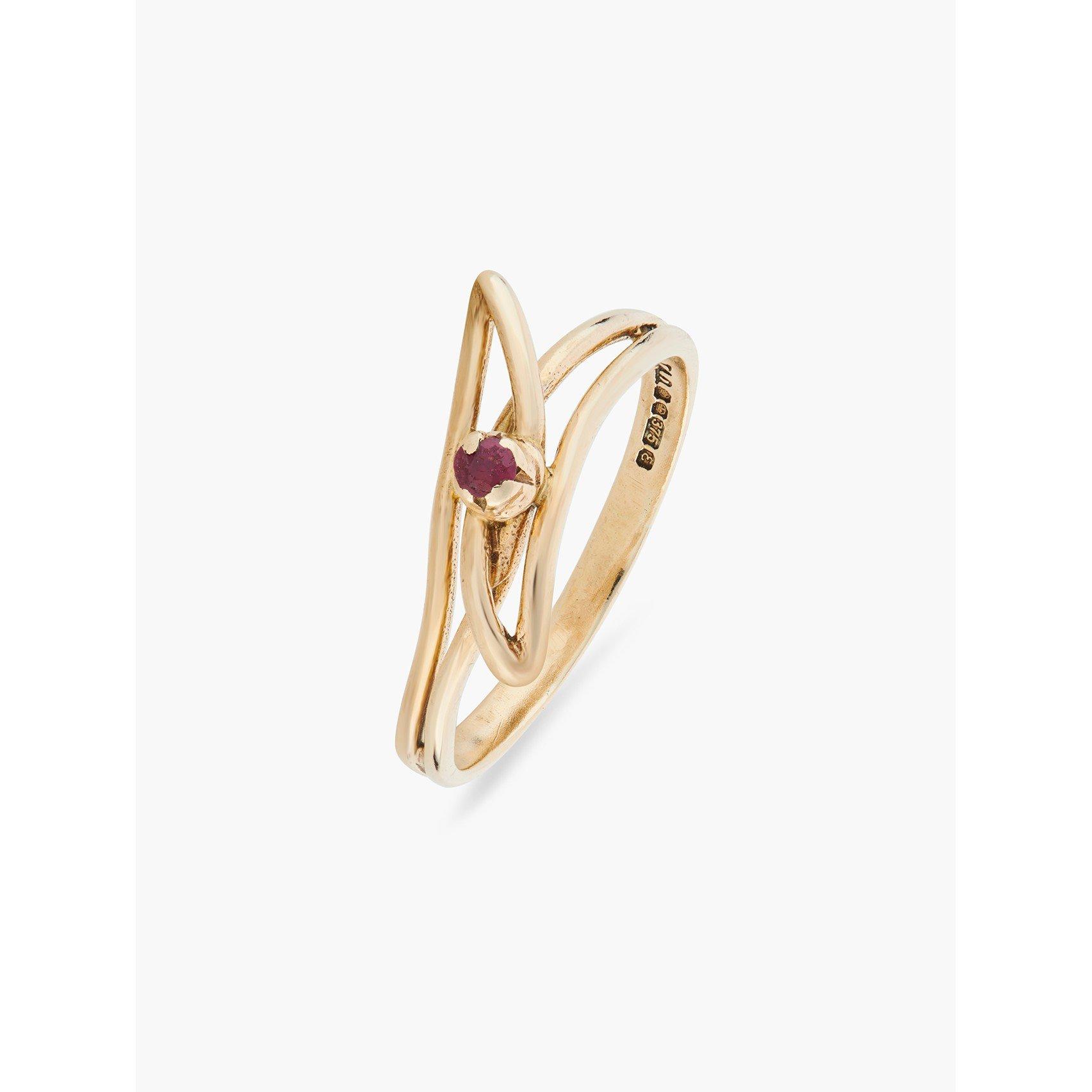 Espree 9ct gold crossover ring set with a solitaire Ruby