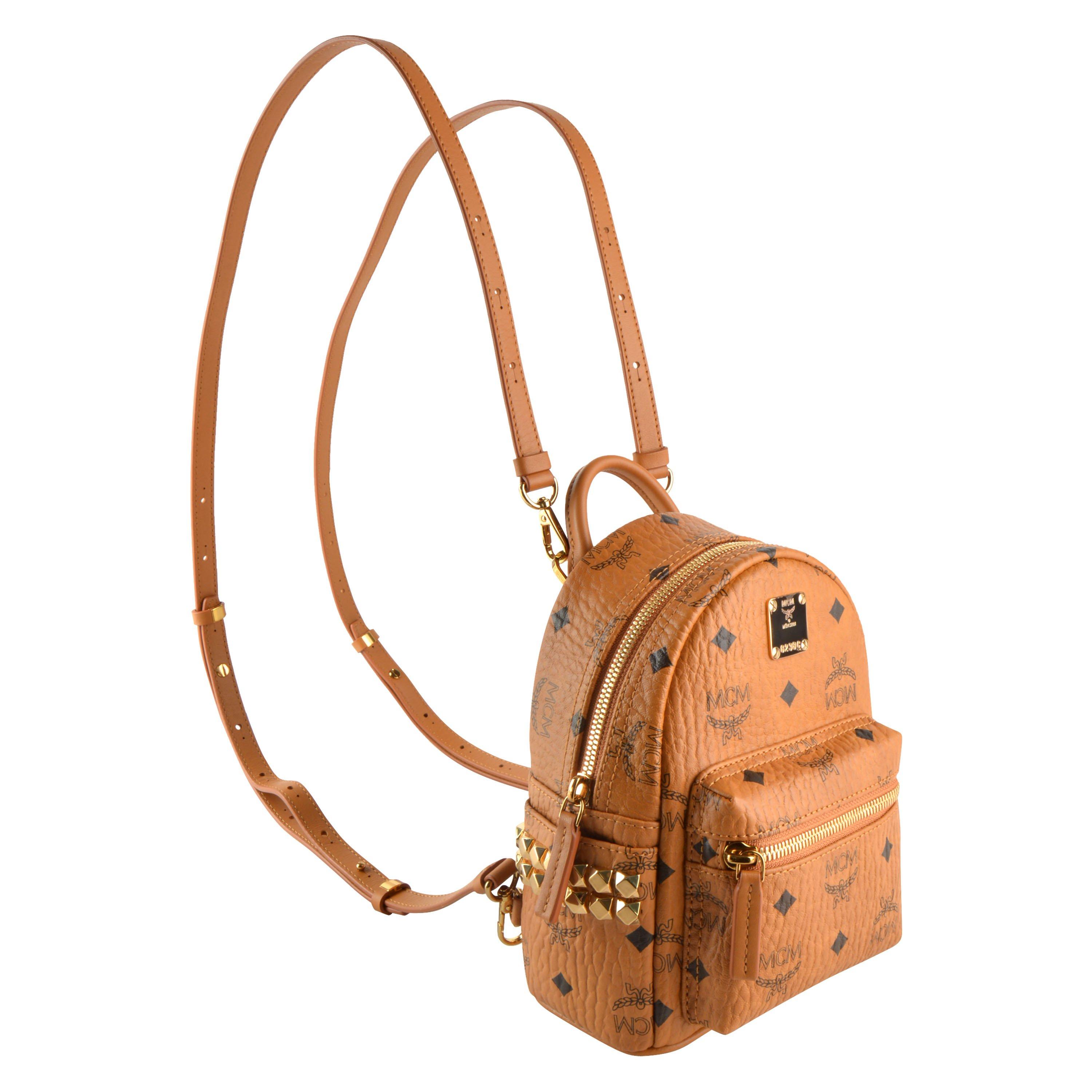 harga mcm mini backpack Stark Side Studs Bebe Boo in Visetos Cognac Balilene adorned with the MCM monogrammed motif MCM red, black leather Visetos