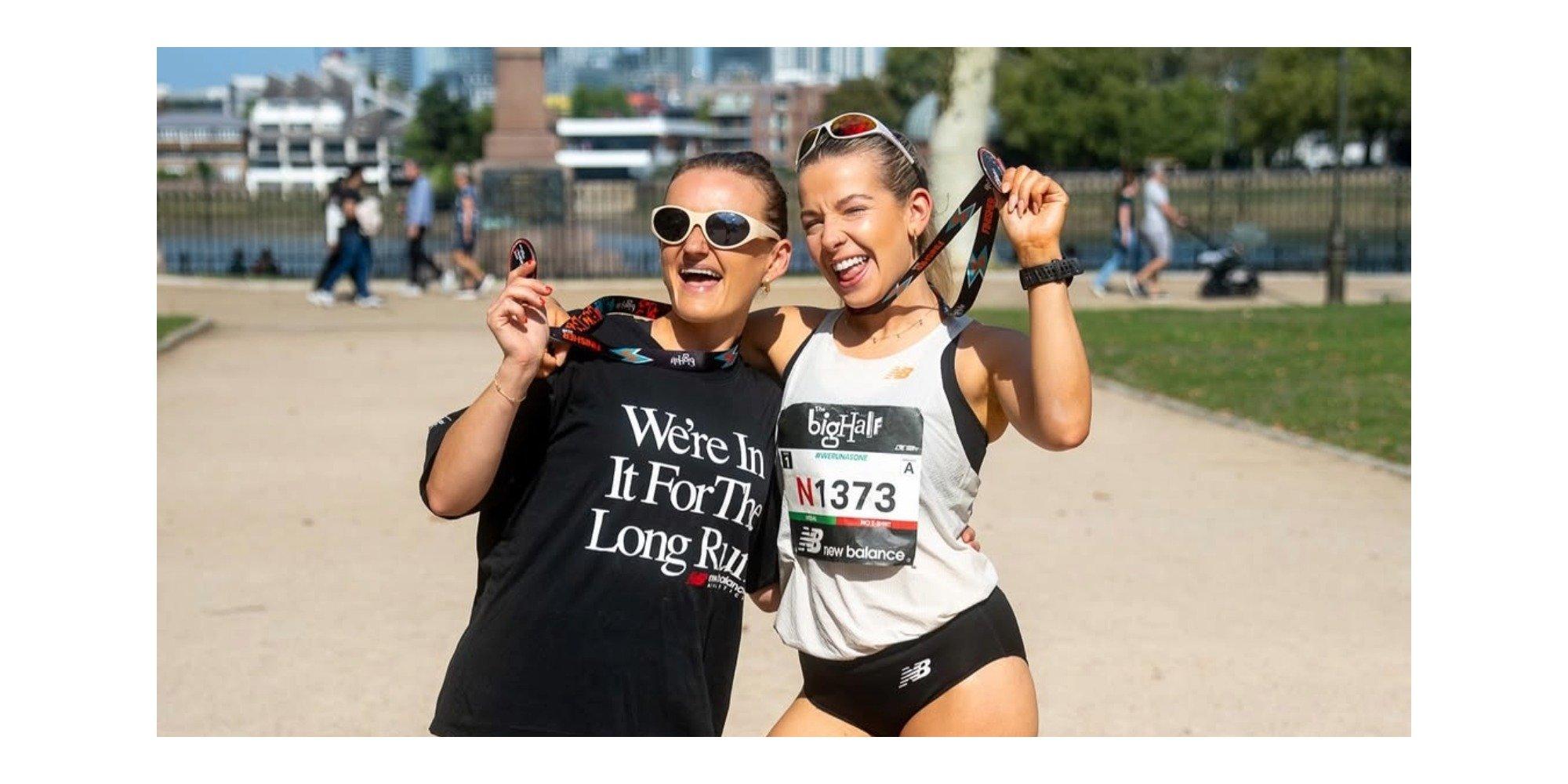 Ally posing with medal and anothe racer