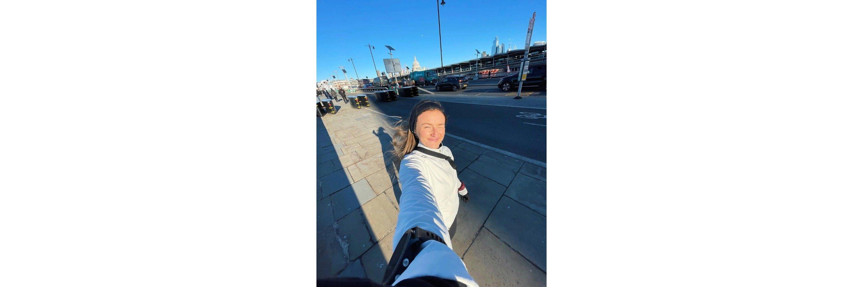 Ally Head stopping to take a photo on a run