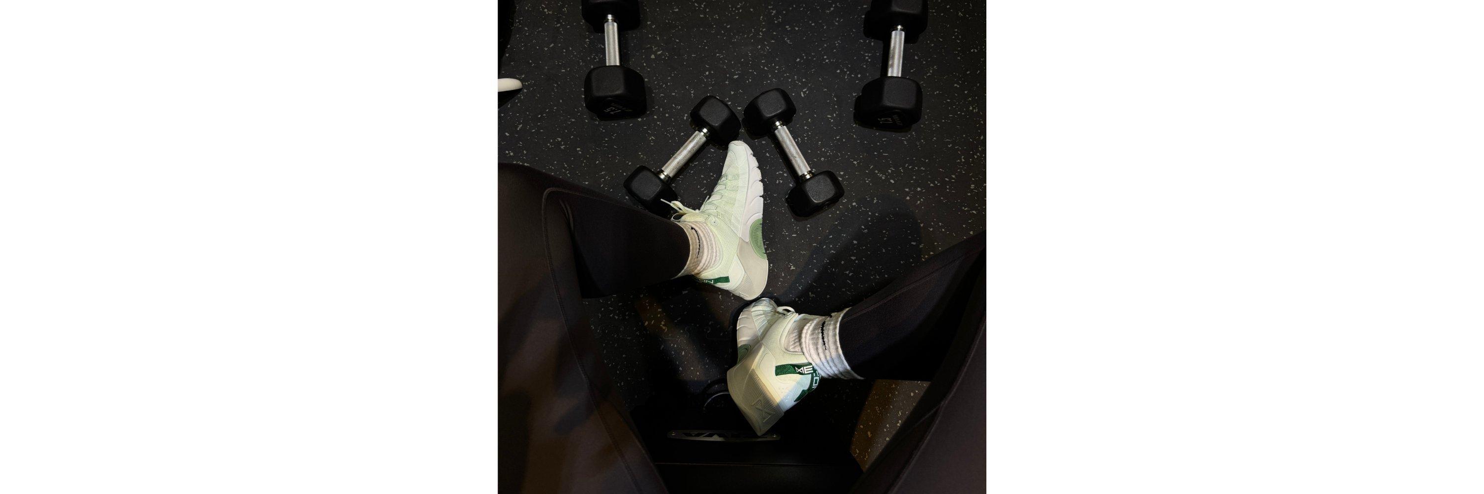 4 Dumbbells on a gym surface floor