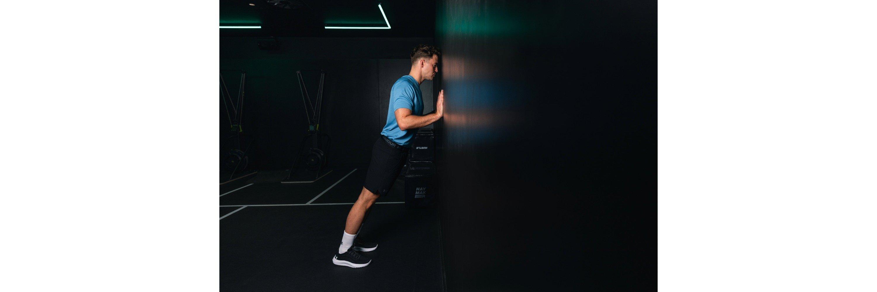 Ethan Allen doing wall push ups