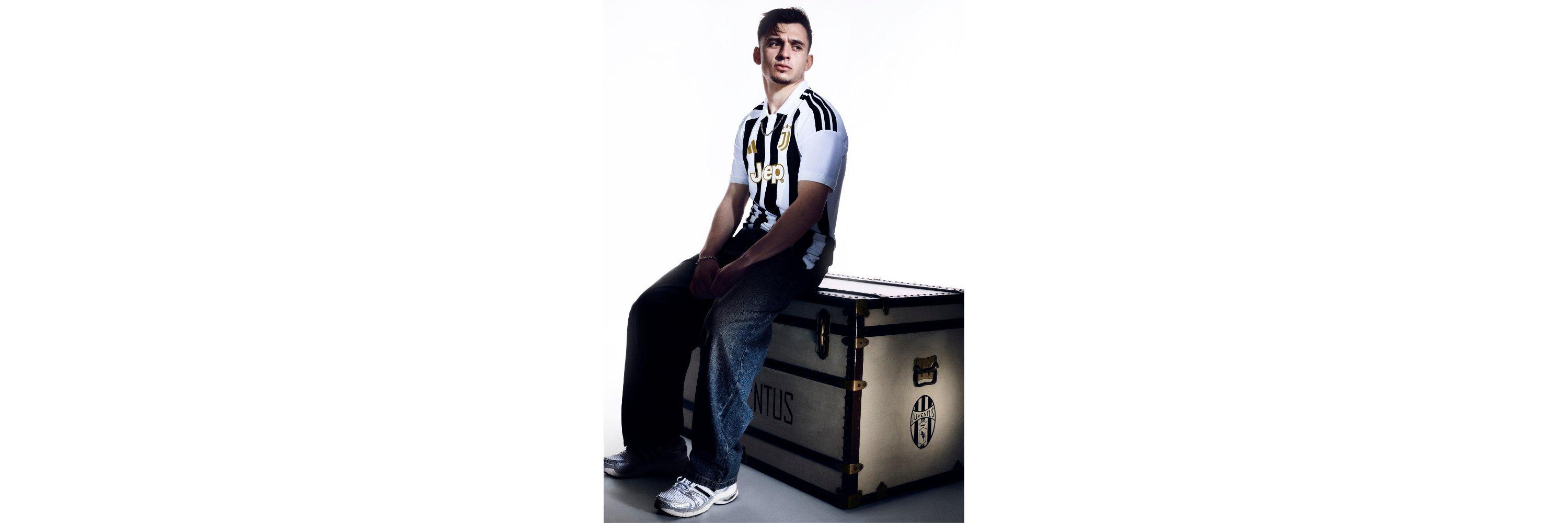A man wearing the new Juventus 2026 / 2027 Football shirt on a box