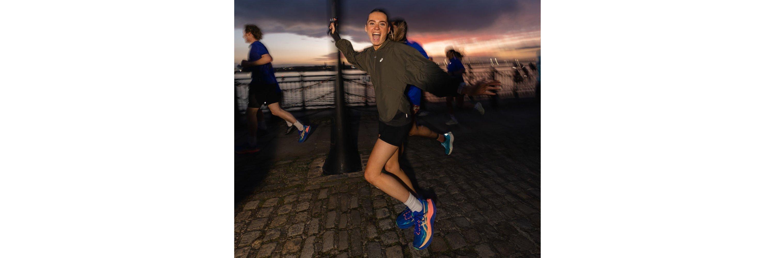 Blurred image of a women wearing running clothes running