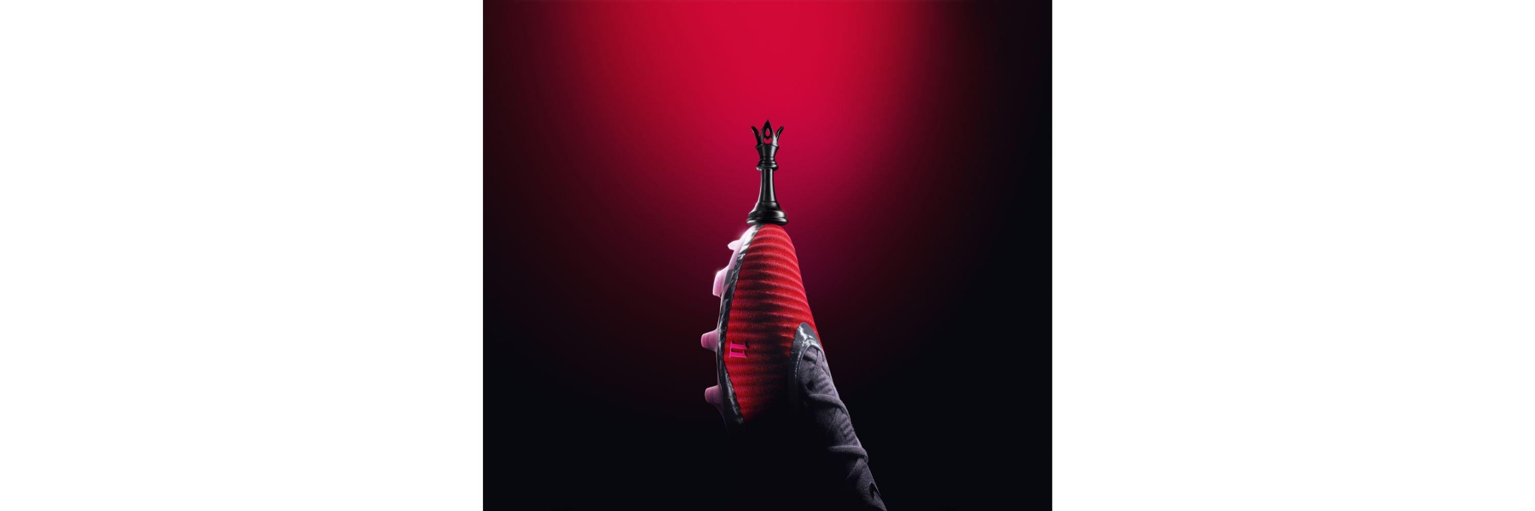 The Nike Phantom 6 with a chess piece on the top