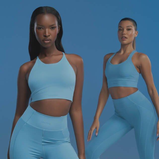 Women posing in USA PRO in fitness outift