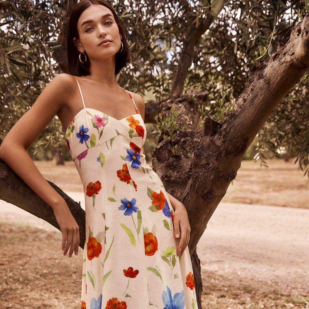 Bloom in a floral dress