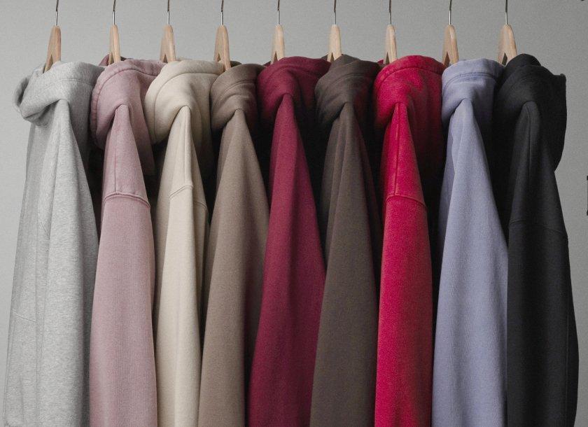 rack of multiple color sweatshirts