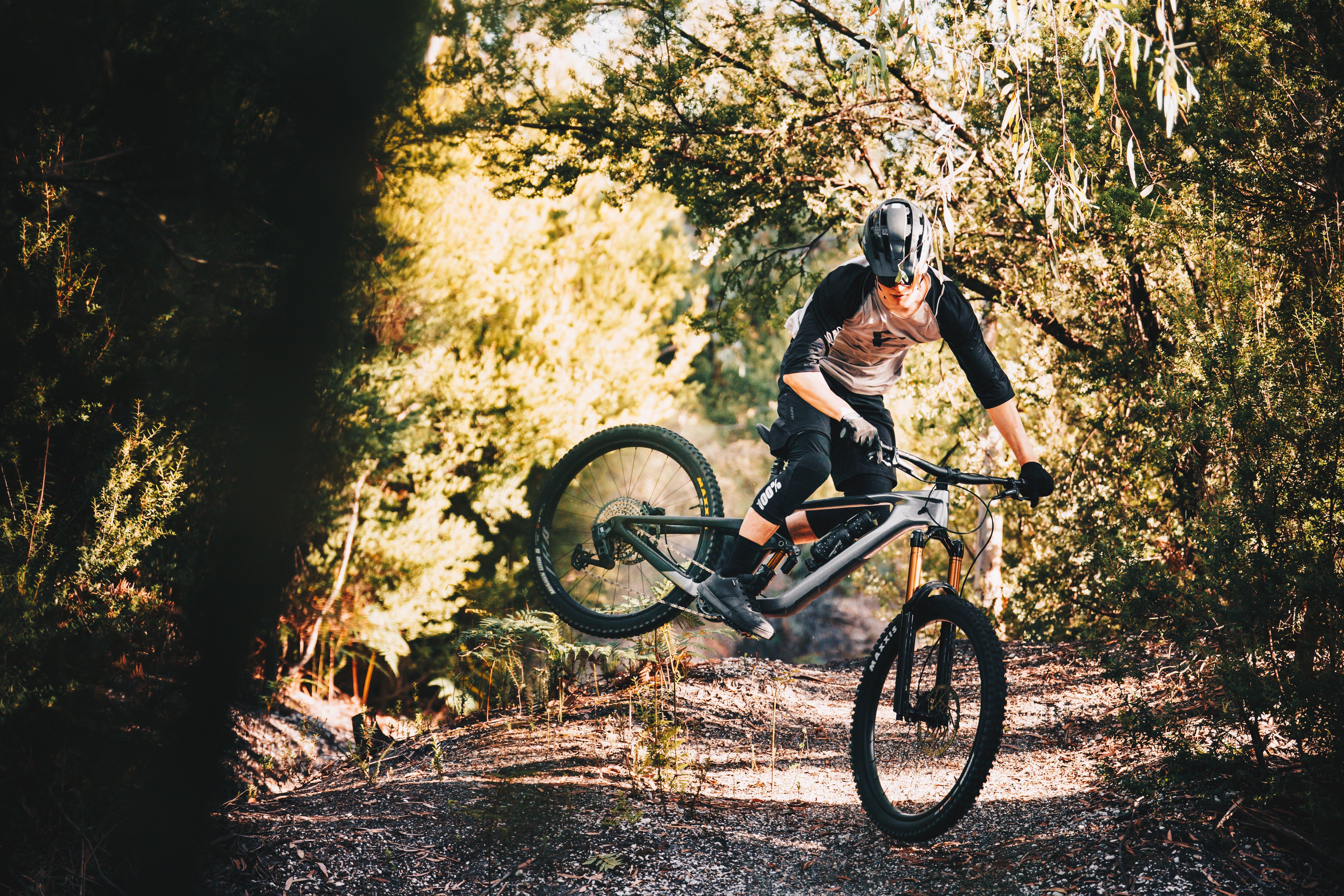 a man riding a mountain bike on a trail