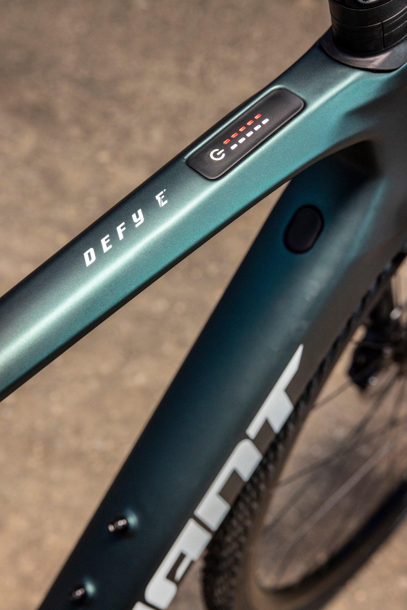 a close up of a bicycle control and electric bike battery