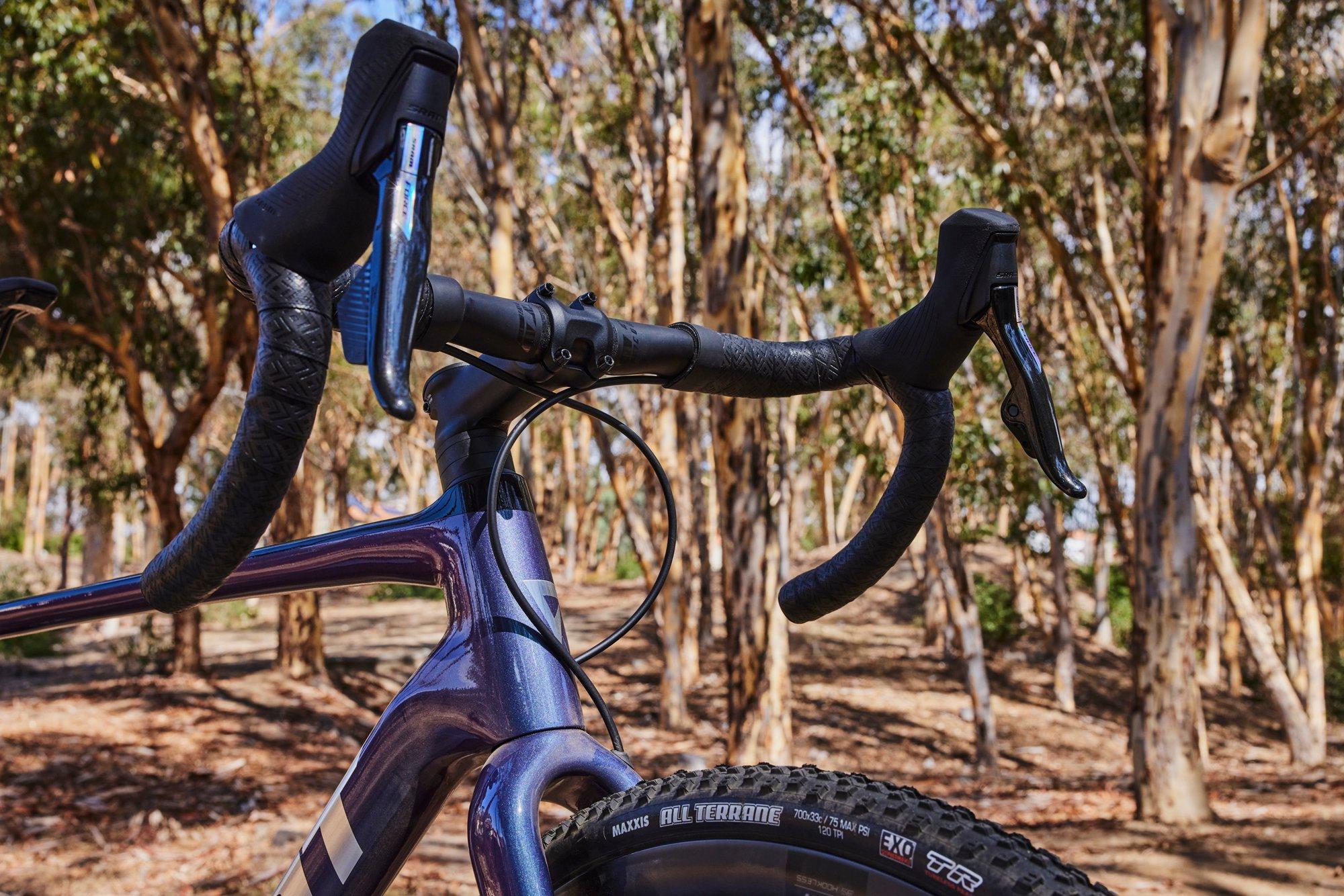 a close up of a bike handle bar and brake levers