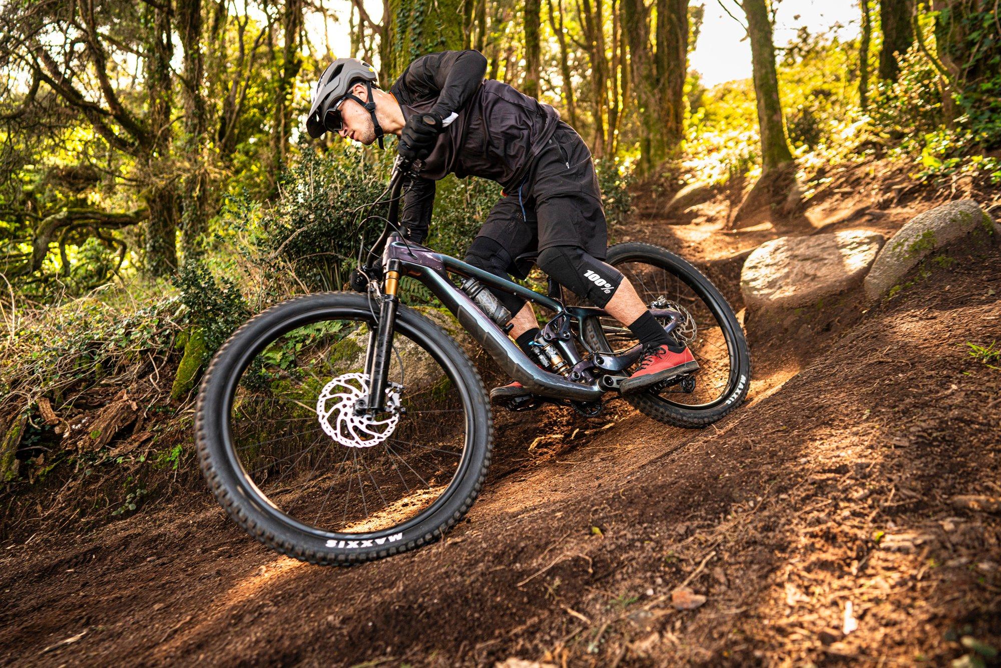 a man riding a mountain bike on a trail