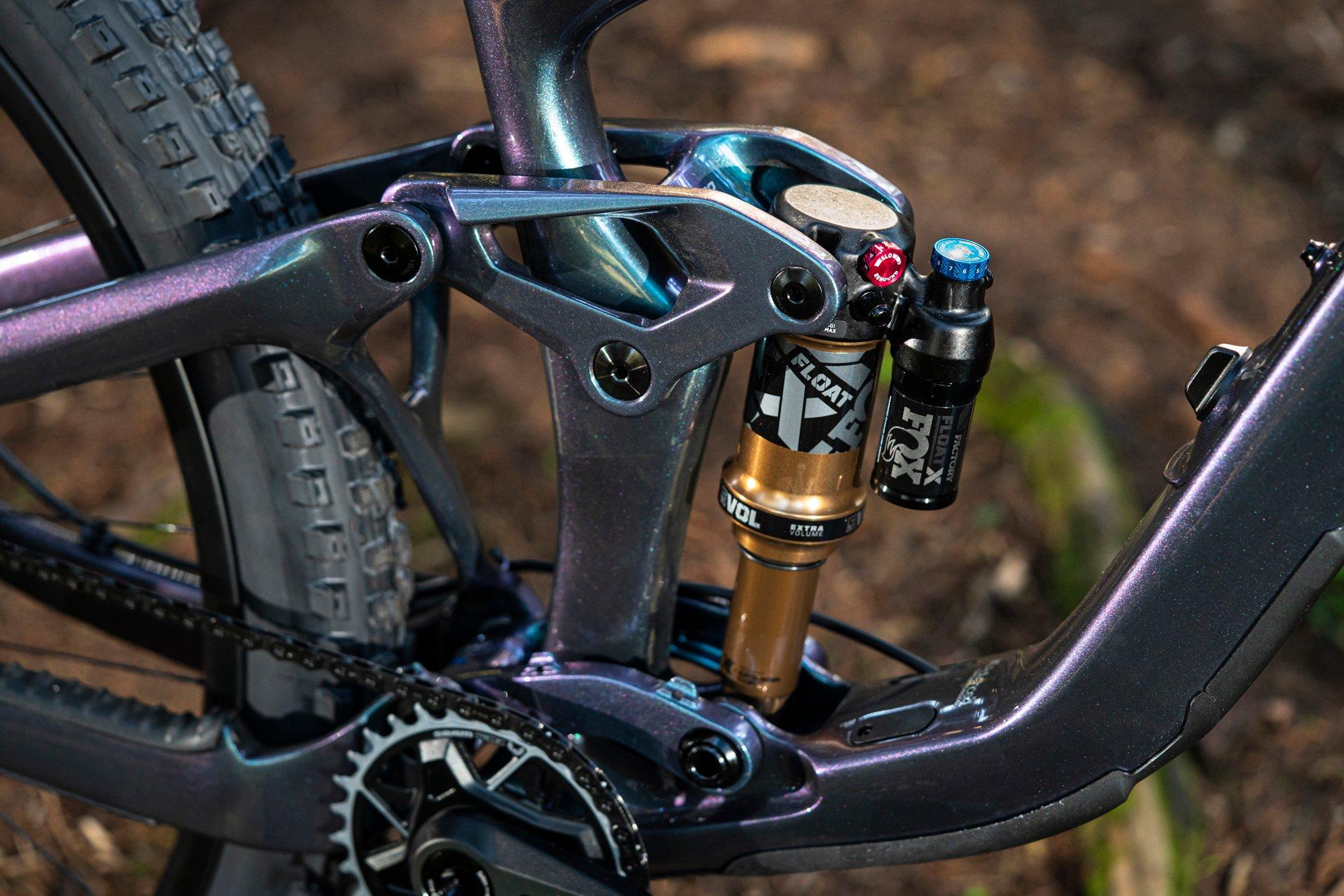 a close up of a bicycle's front wheel and brake