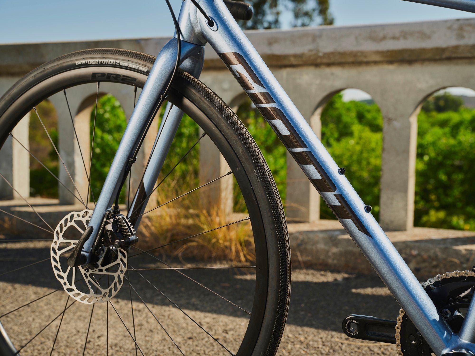a close up of a bicycle on a bridge