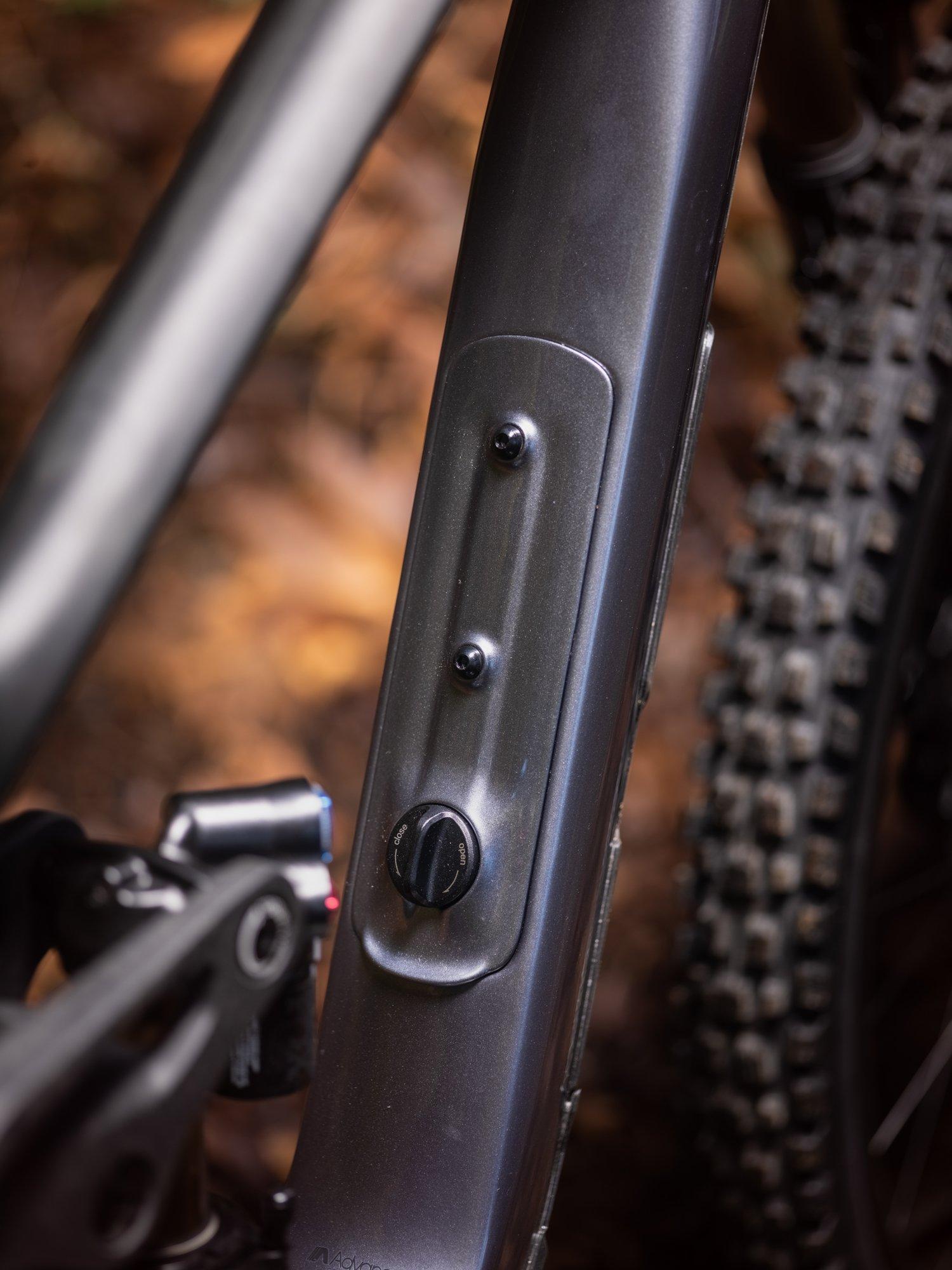 a close up of a bicycle's downtube storage