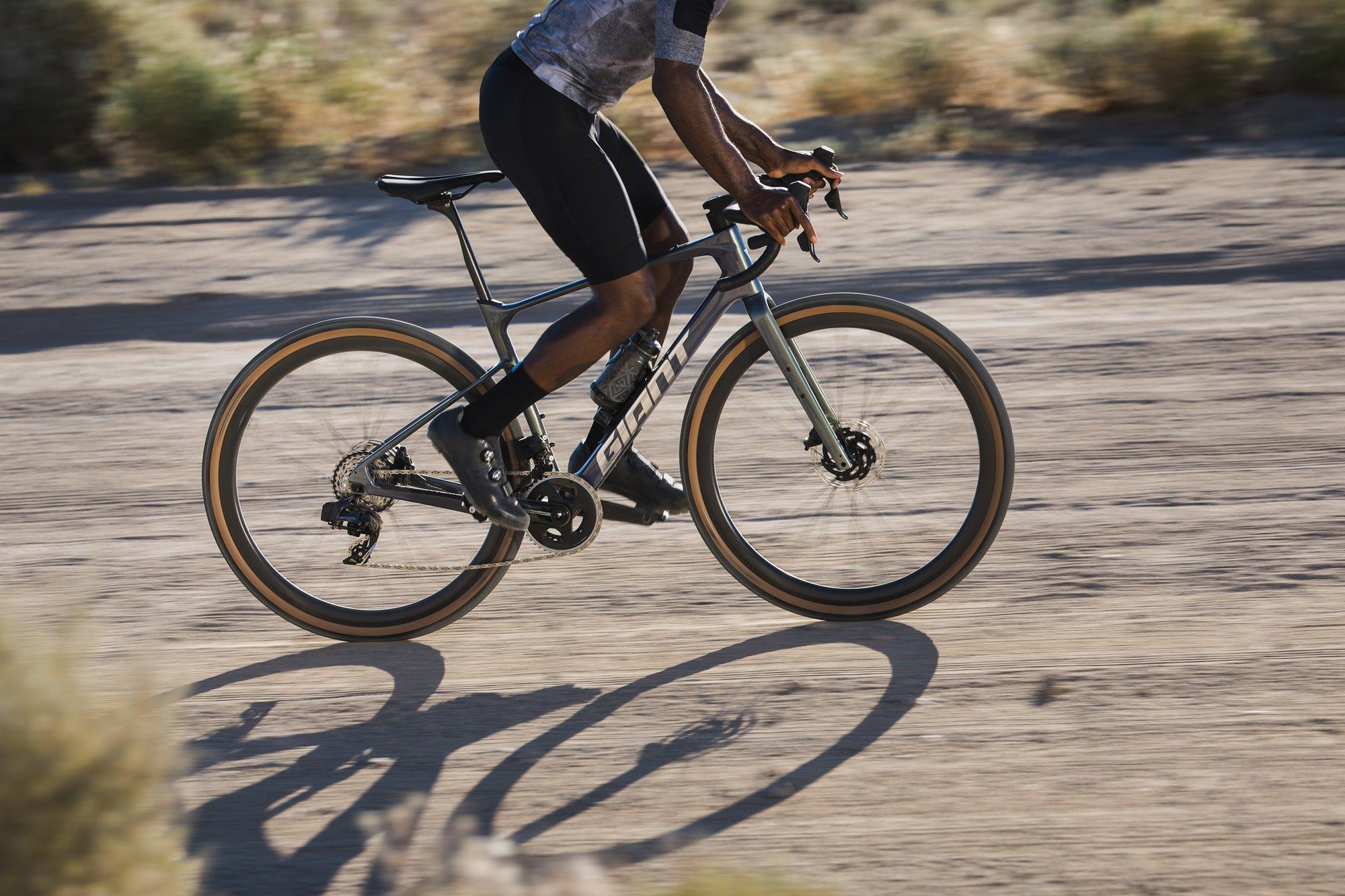 cyclist on a gravel bike on dirt road