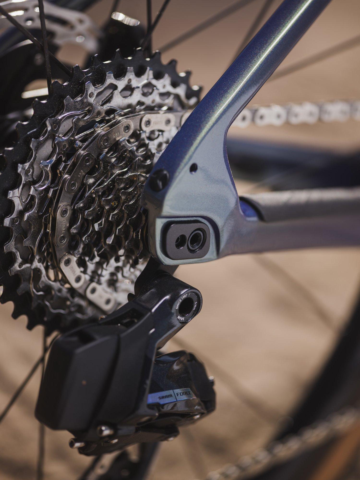 a close up of a bicycle's gear and chain drive
