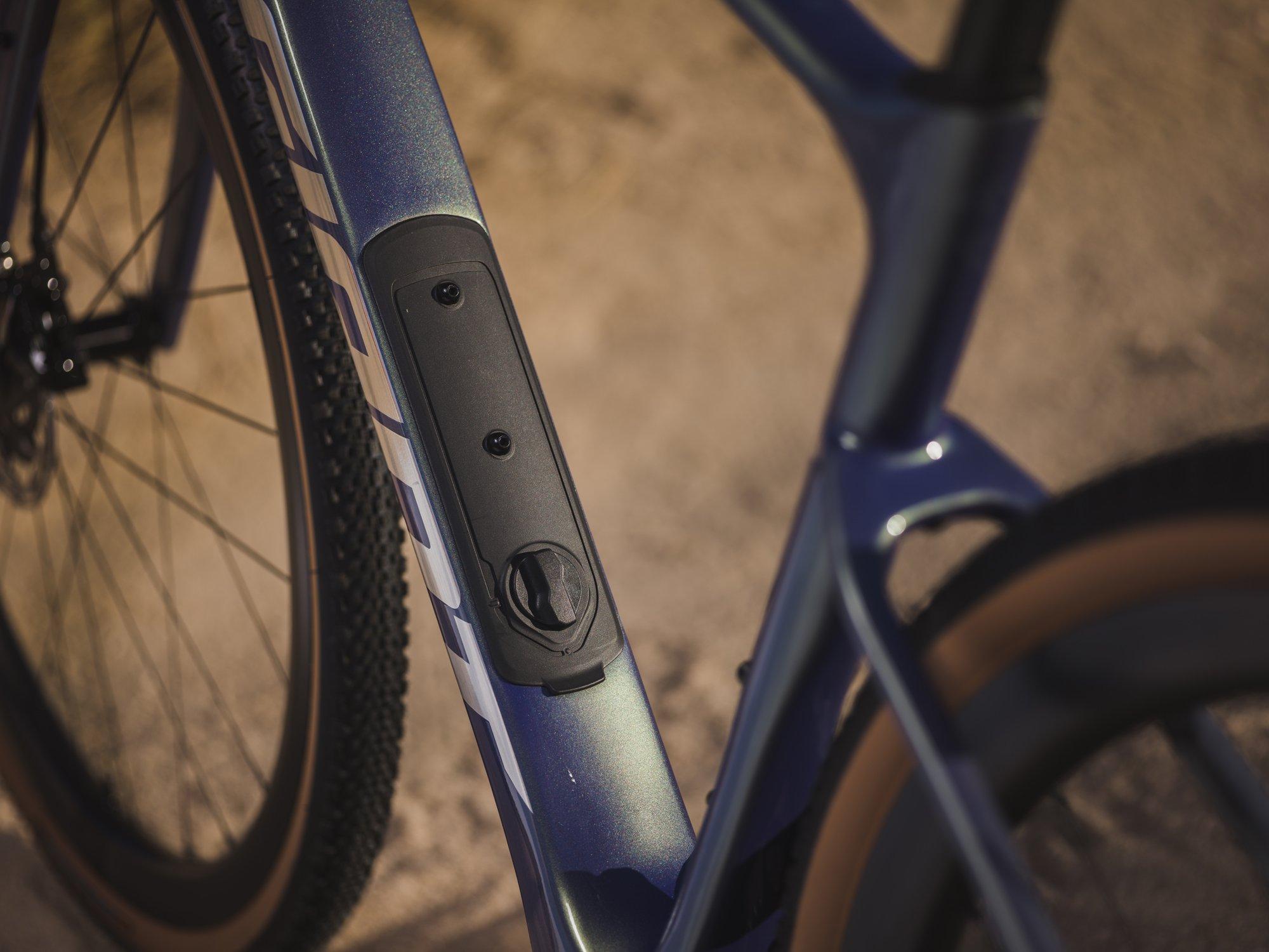 a close up of a bicycle downtube with storage on it