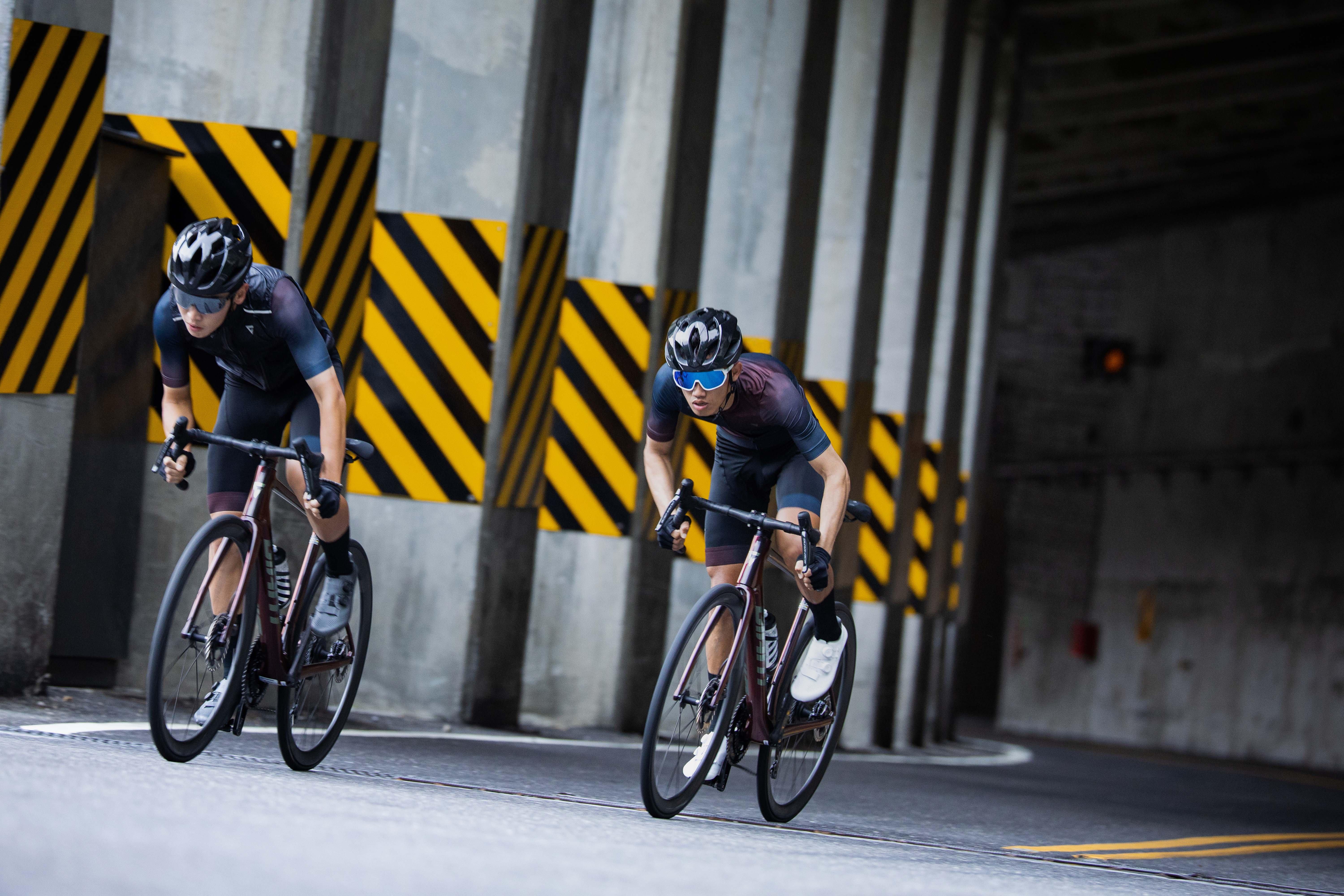 two cyclists on road bikes