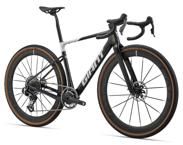 the giant bike is purple with brown tyres