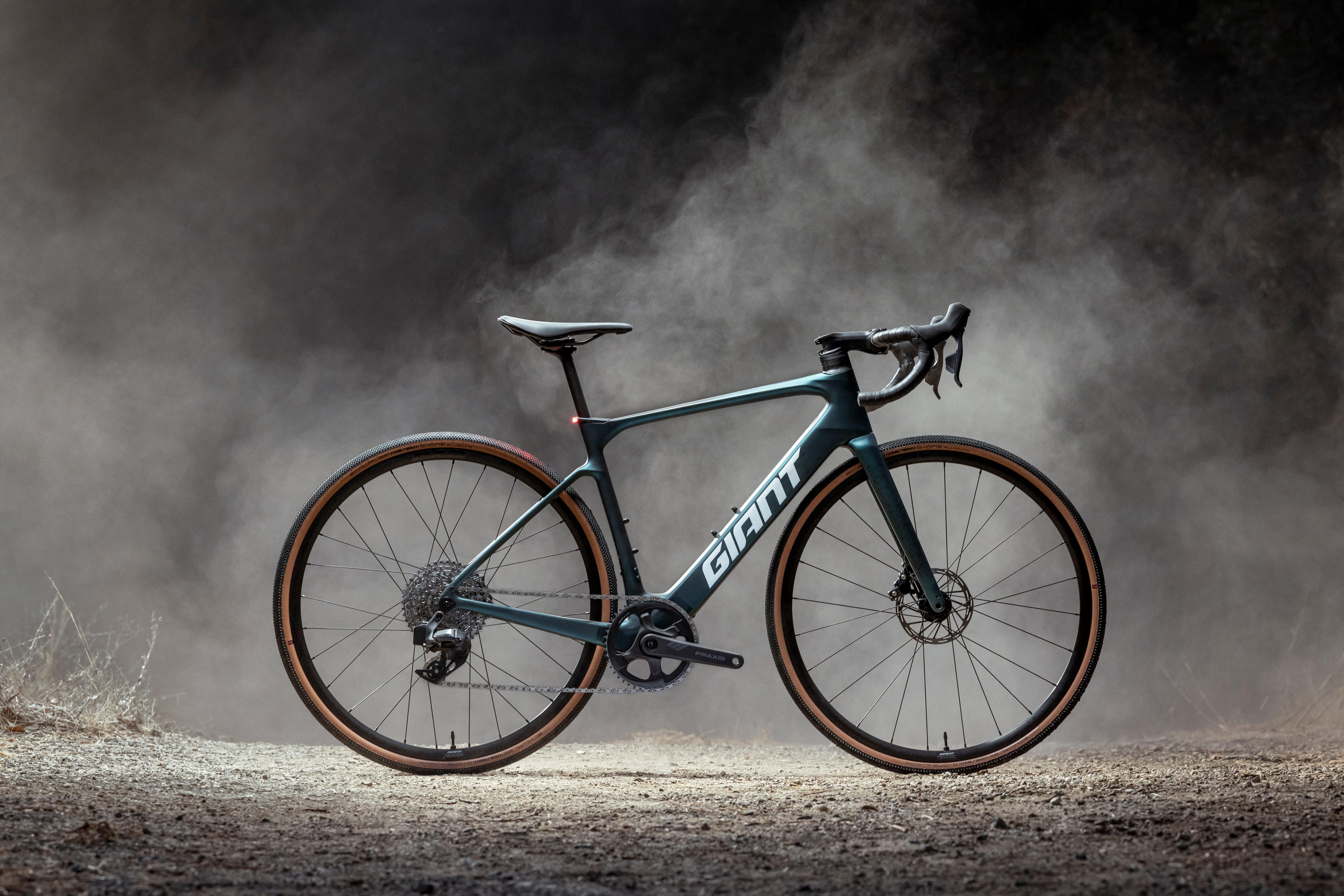 a bike is shown in a field of smoke