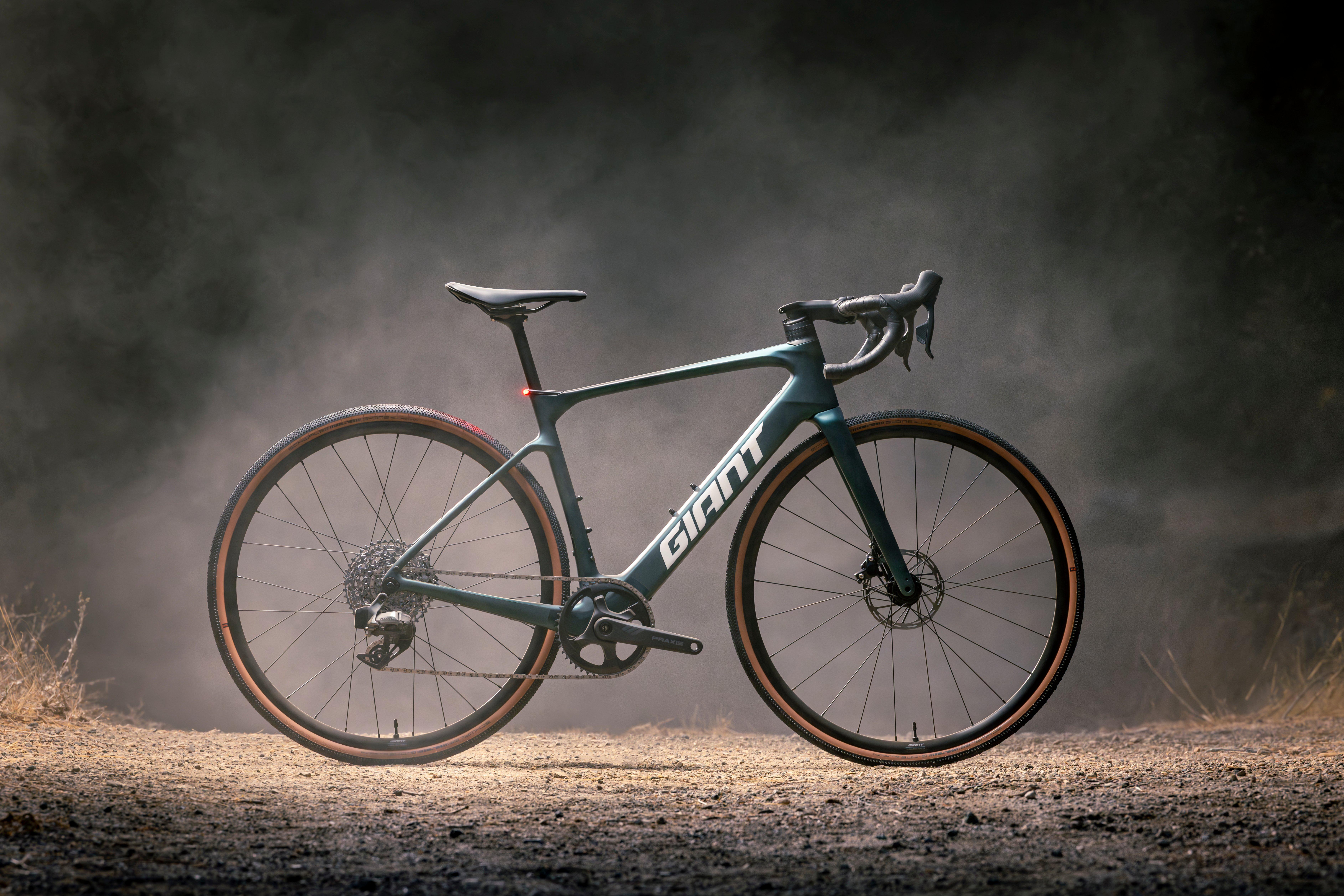 a bike is shown in a dark area with smoke