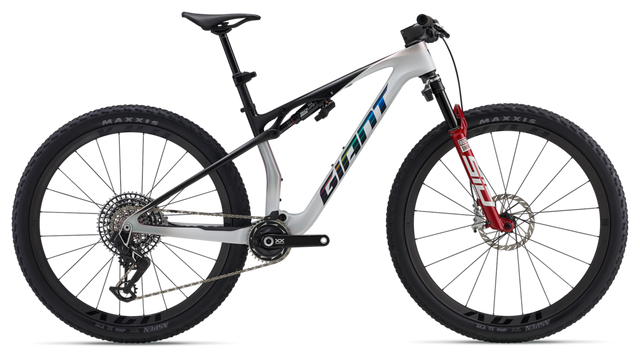 a black mountain bike with a large wheel and spokes