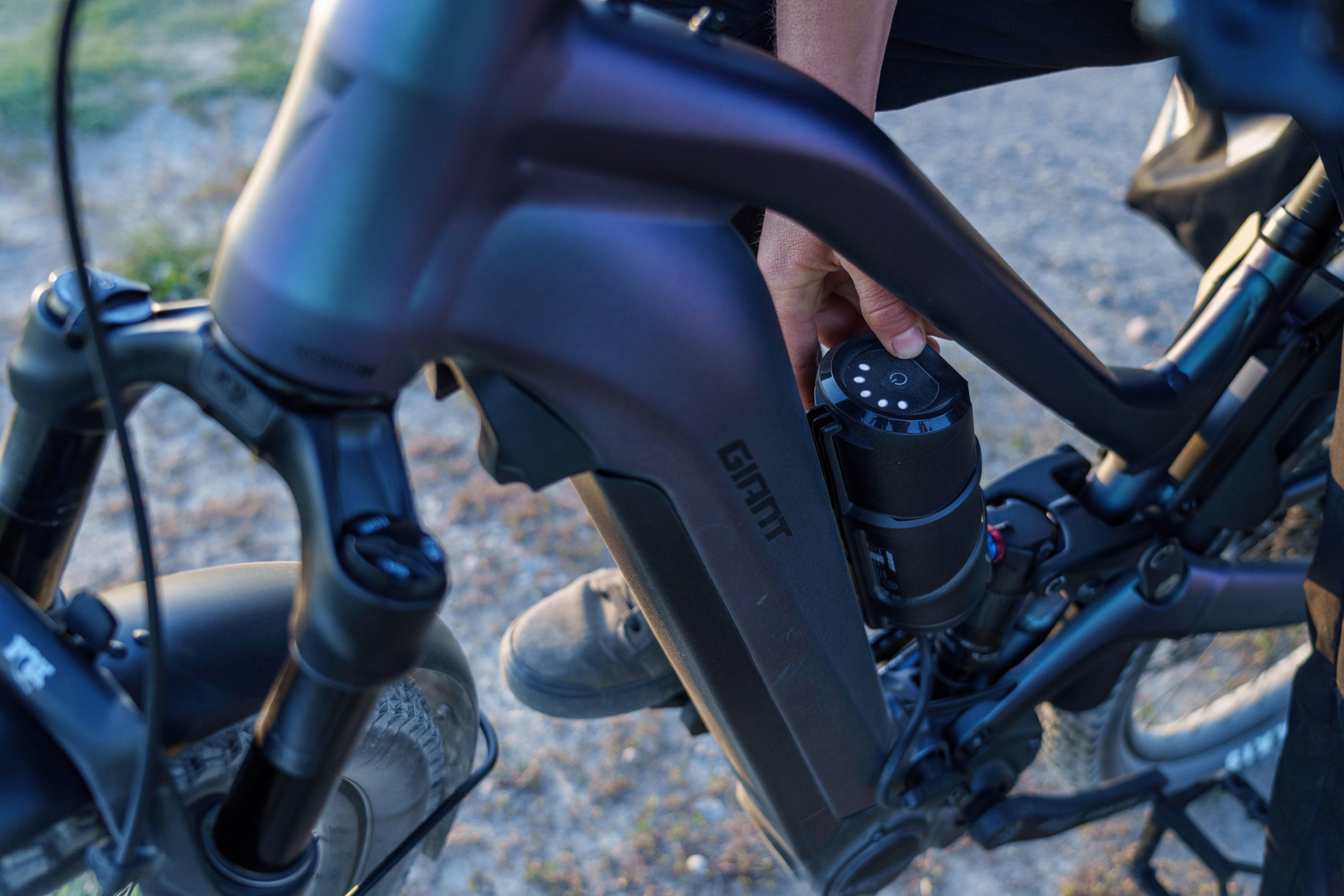 a close up of a person's hand on a bicycle