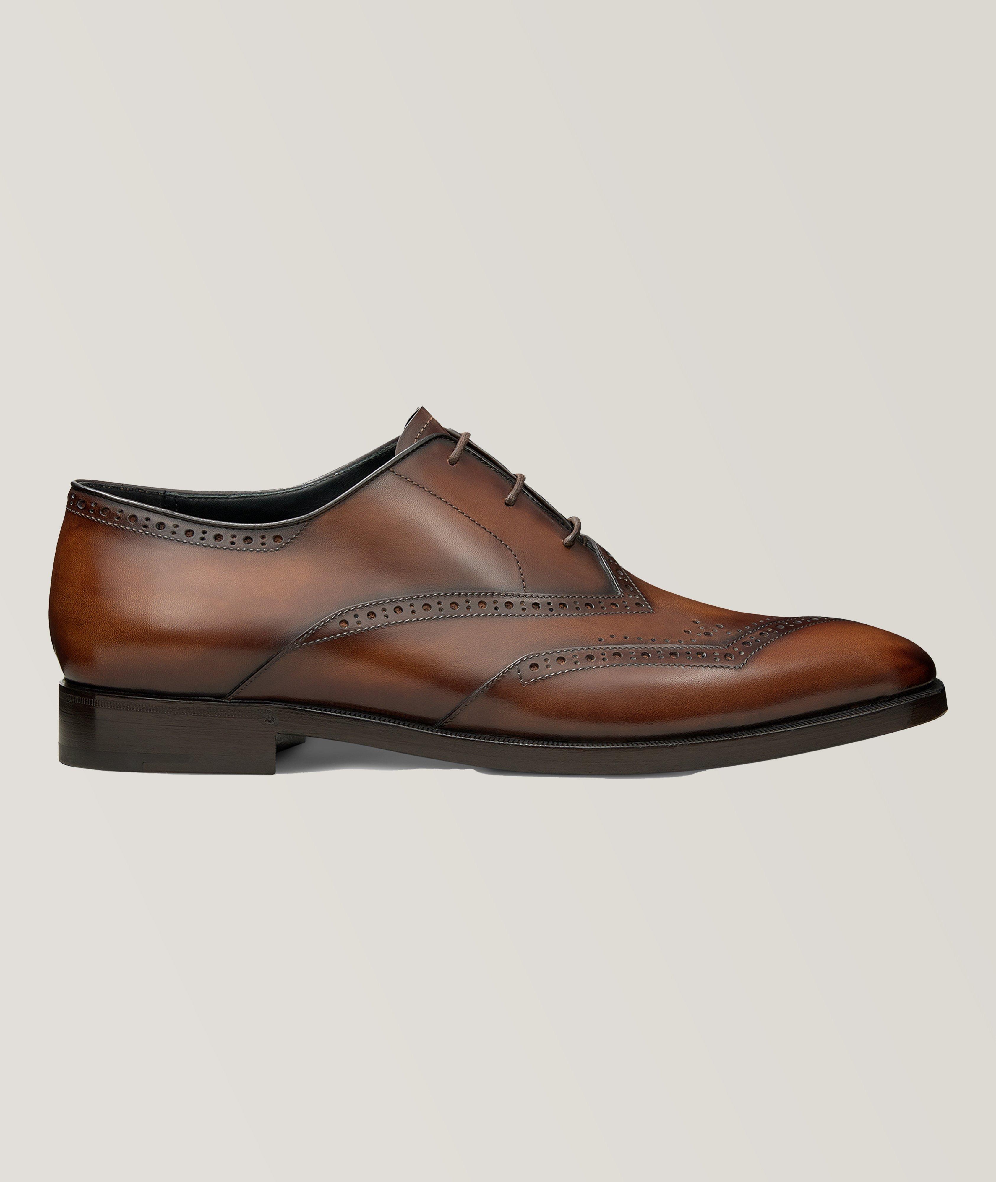 Chaussure lacée en cuir à perforations asymétriques image 0